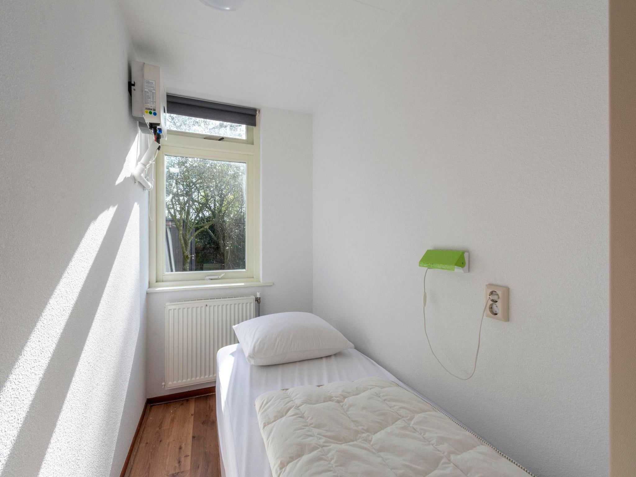 Een slaapkamer van Eureka 83 in Sint Maartenszee
