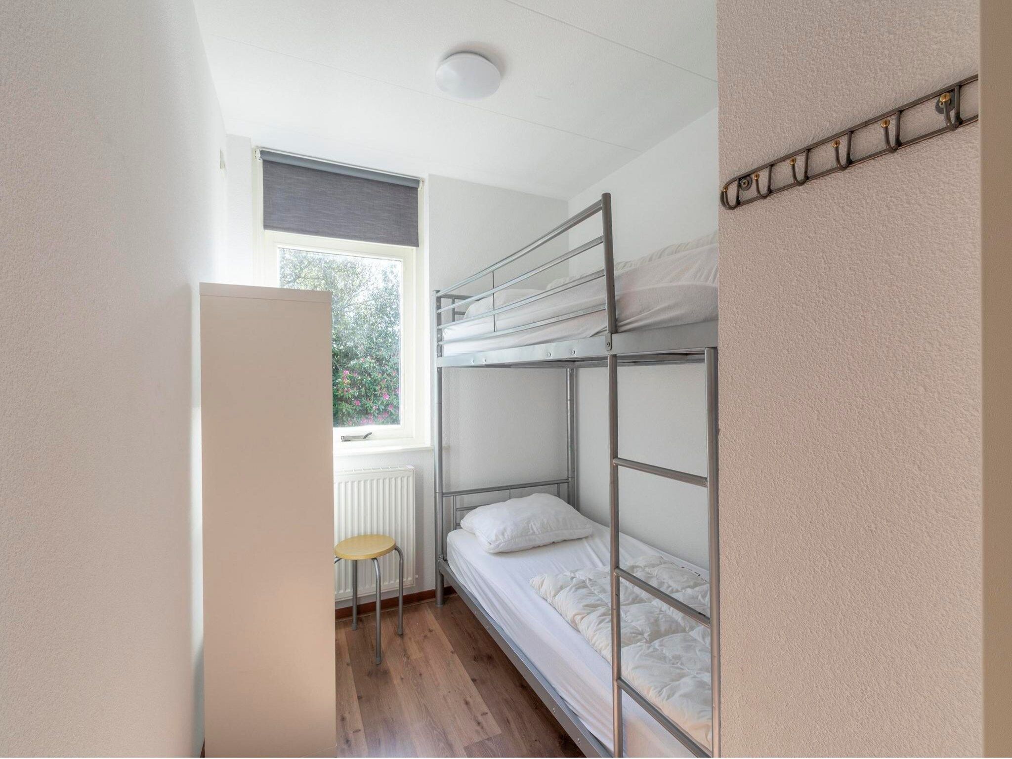 Een slaapkamer van Eureka 83 in Sint Maartenszee