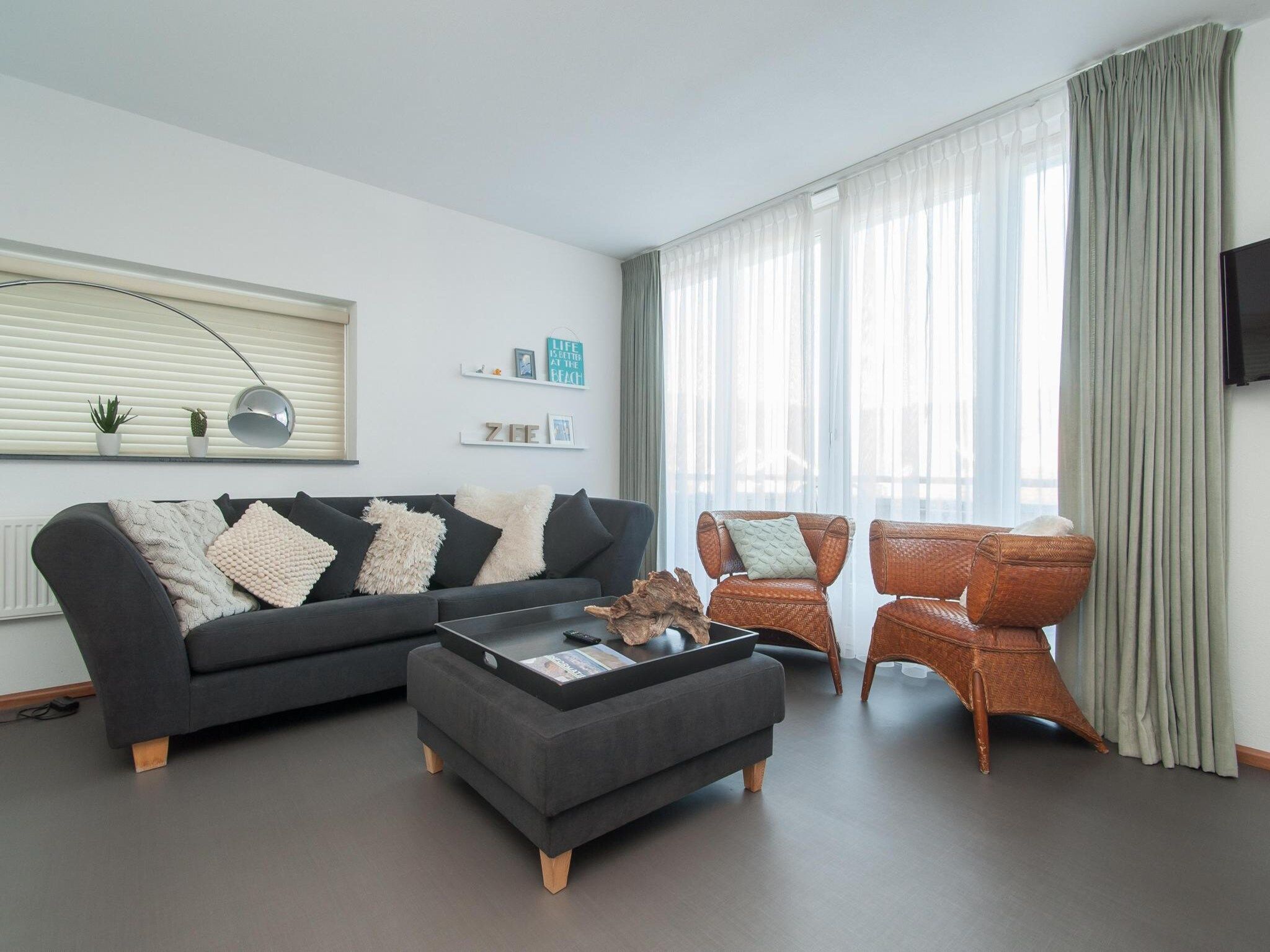 De woonkamer van Suite Duinzicht in Callantsoog