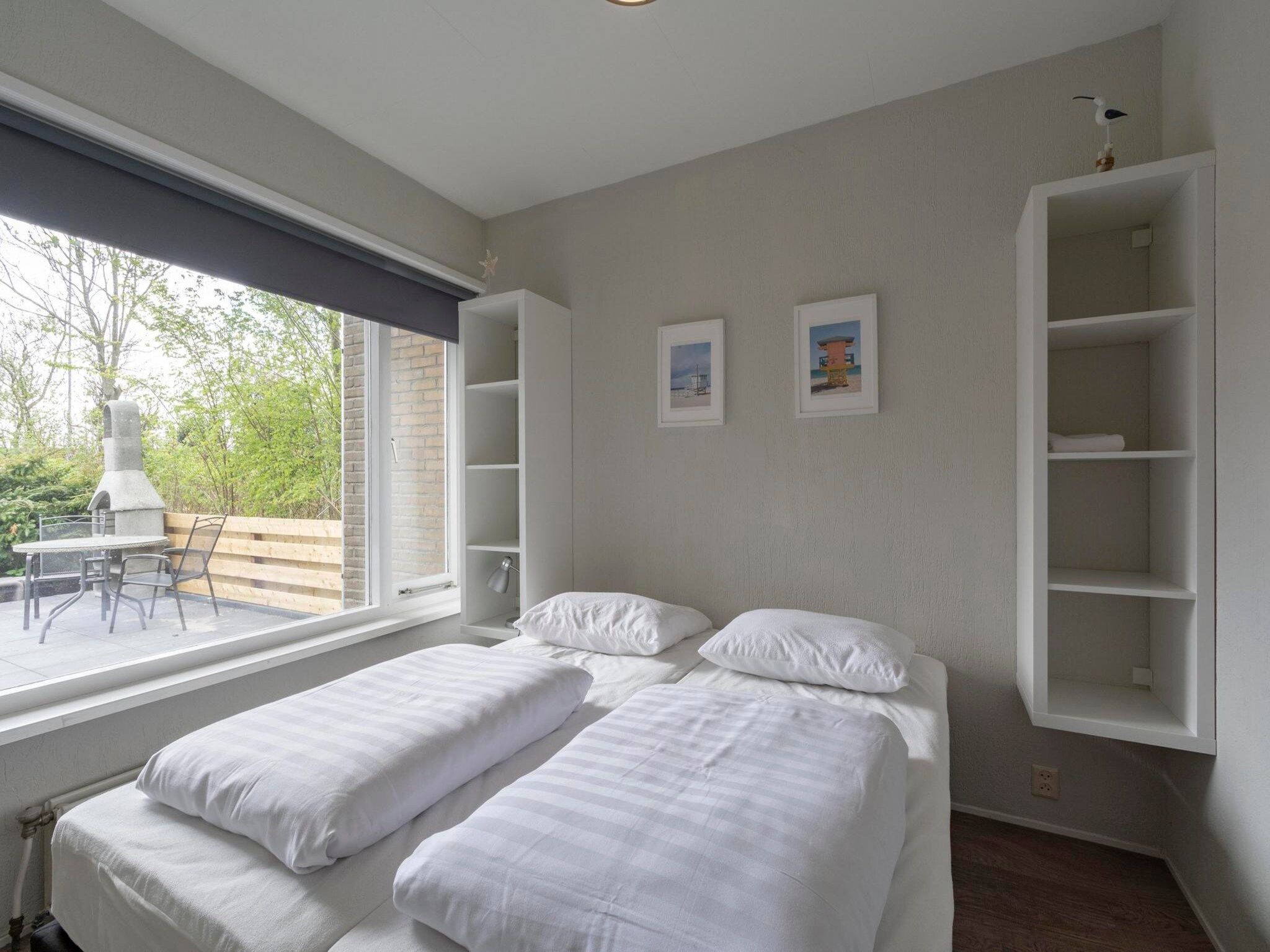 Een slaapkamer van Garnekuul 12 in Callantsoog