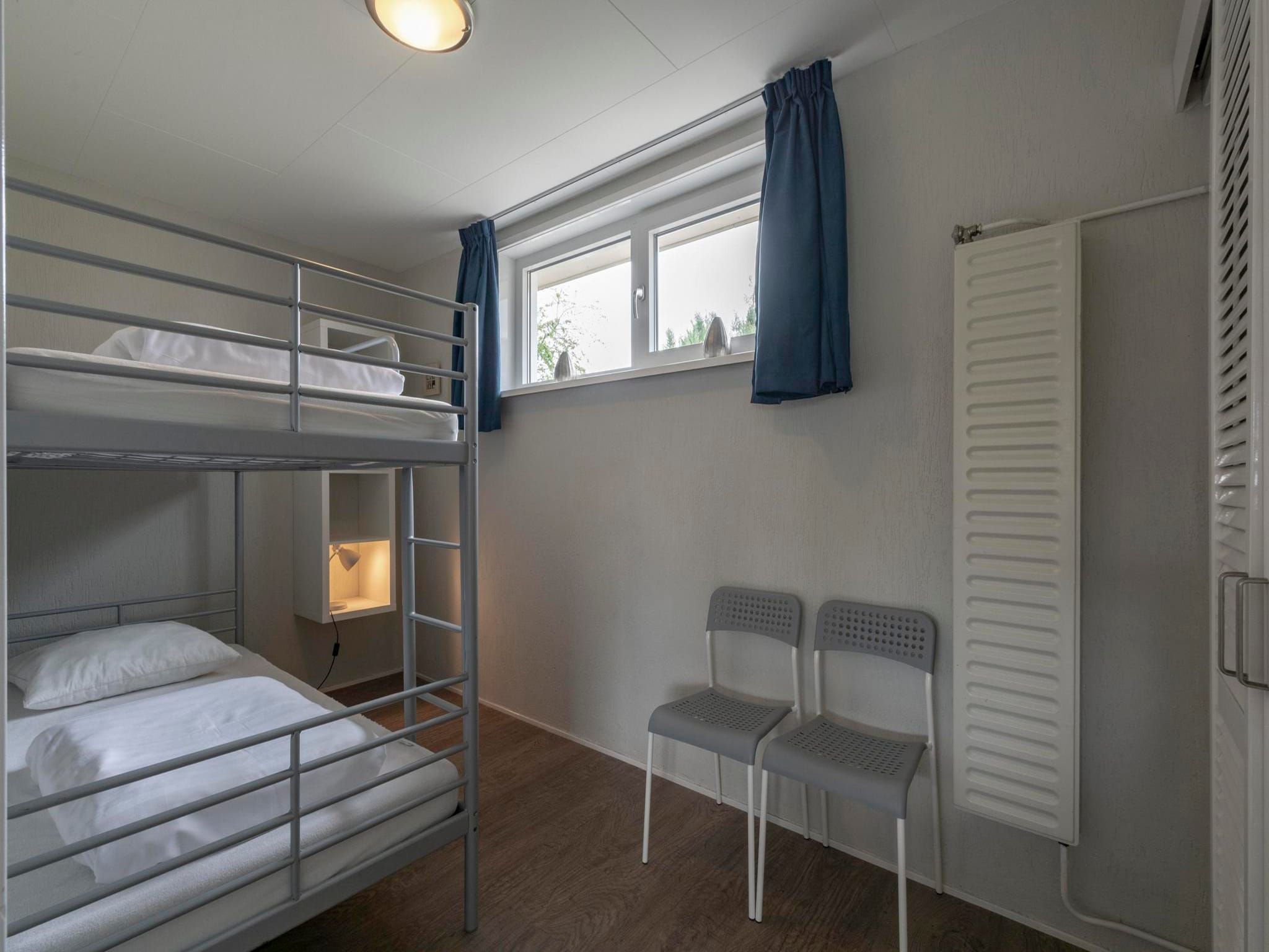 Een slaapkamer van Garnekuul 12 in Callantsoog