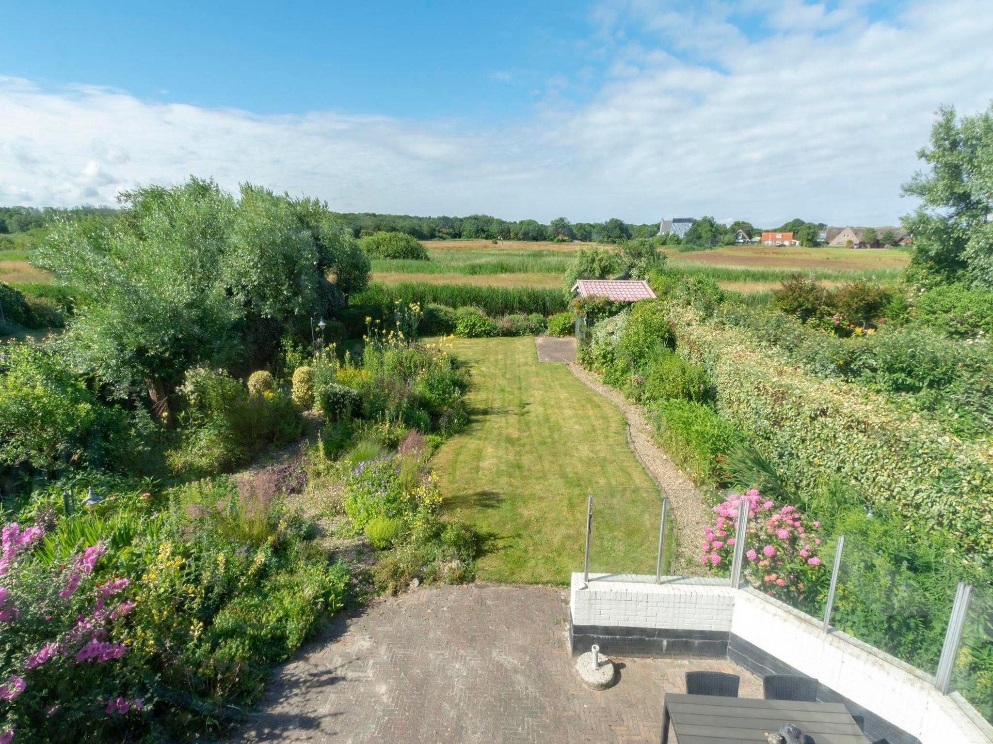 Het uitzicht vanaf De Buitenplaats 16 in Callantsoog