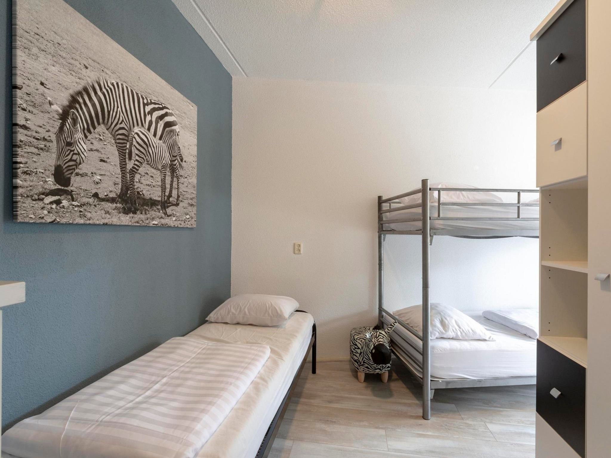 Een slaapkamer van Résidence Juliana 58 in Julianadorp aan Zee
