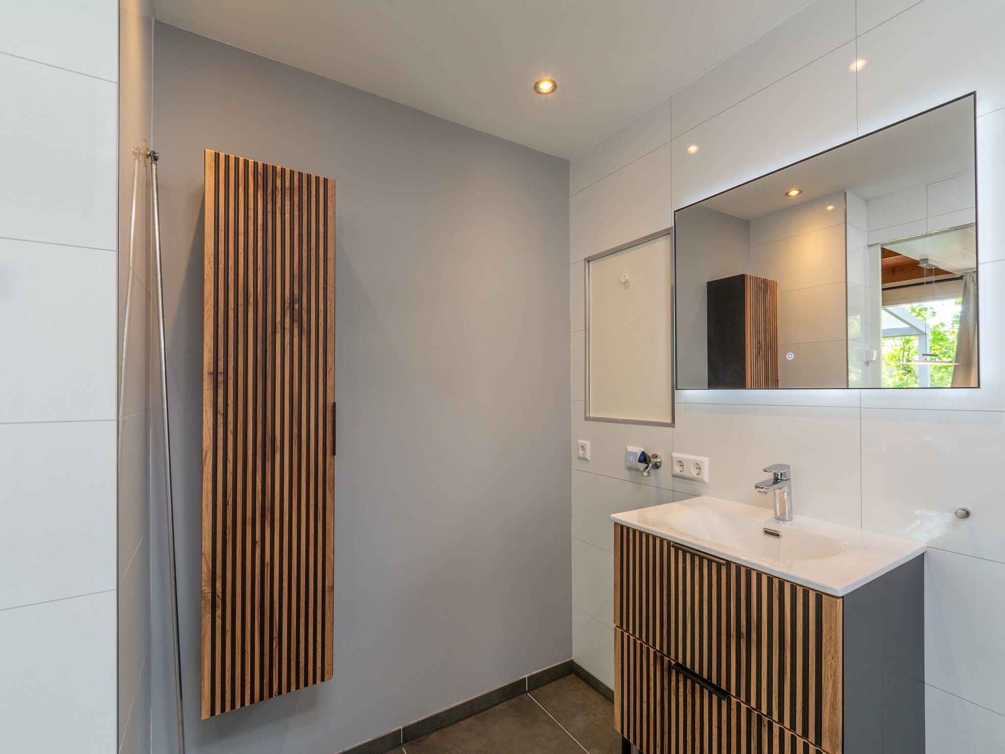 De badkamer van Garnekuul 18 in Callantsoog