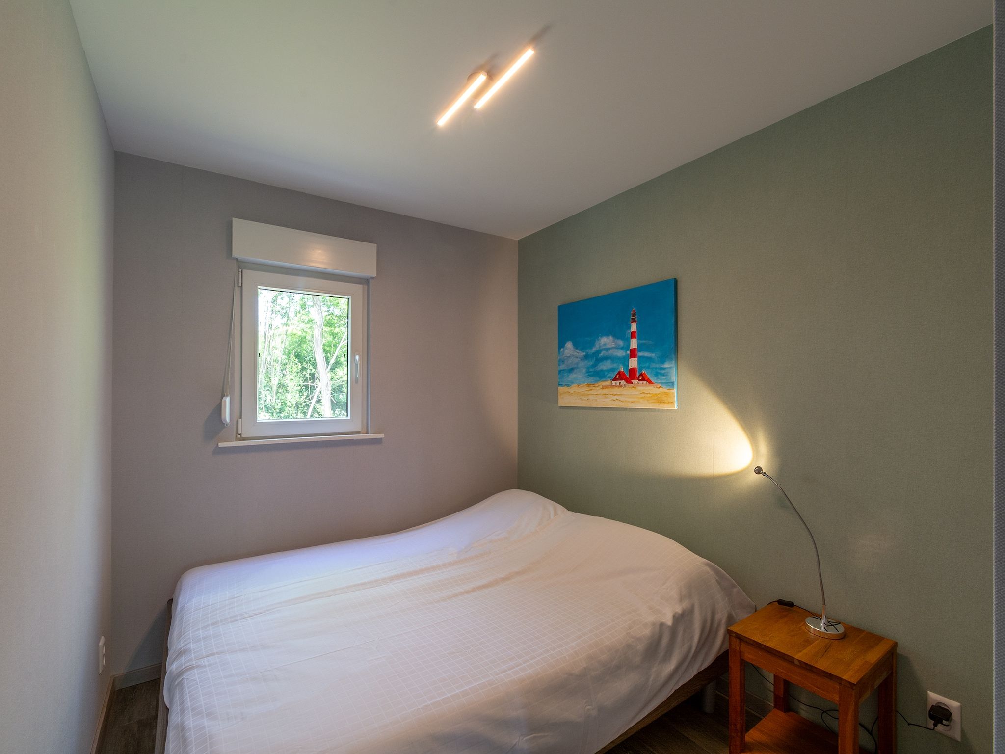 Een slaapkamer van Garnekuul 18 in Callantsoog