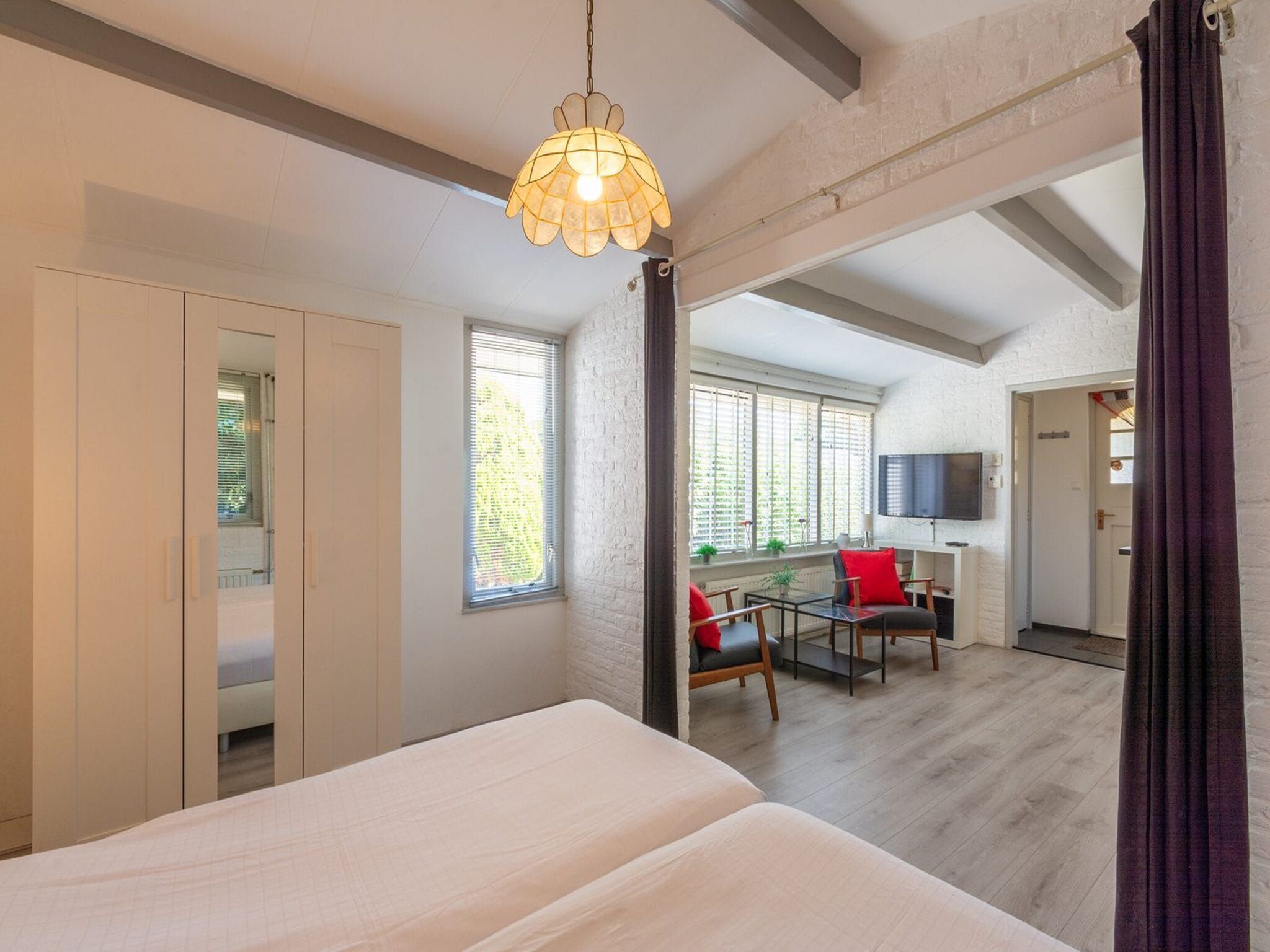 Een slaapkamer van Garnekuul 26 in Callantsoog