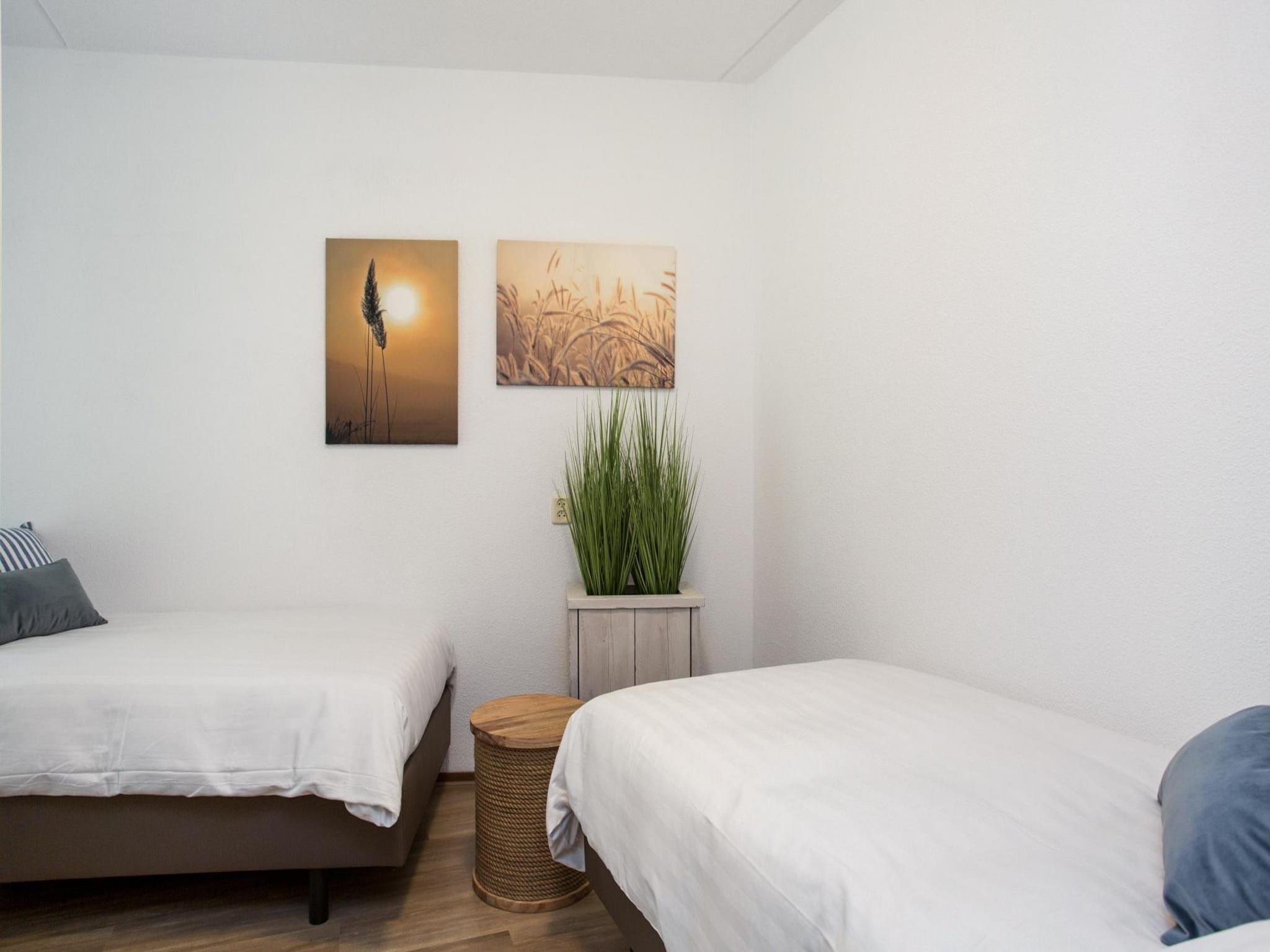 Een slaapkamer van Résidence Juliana 57 in Julianadorp aan Zee