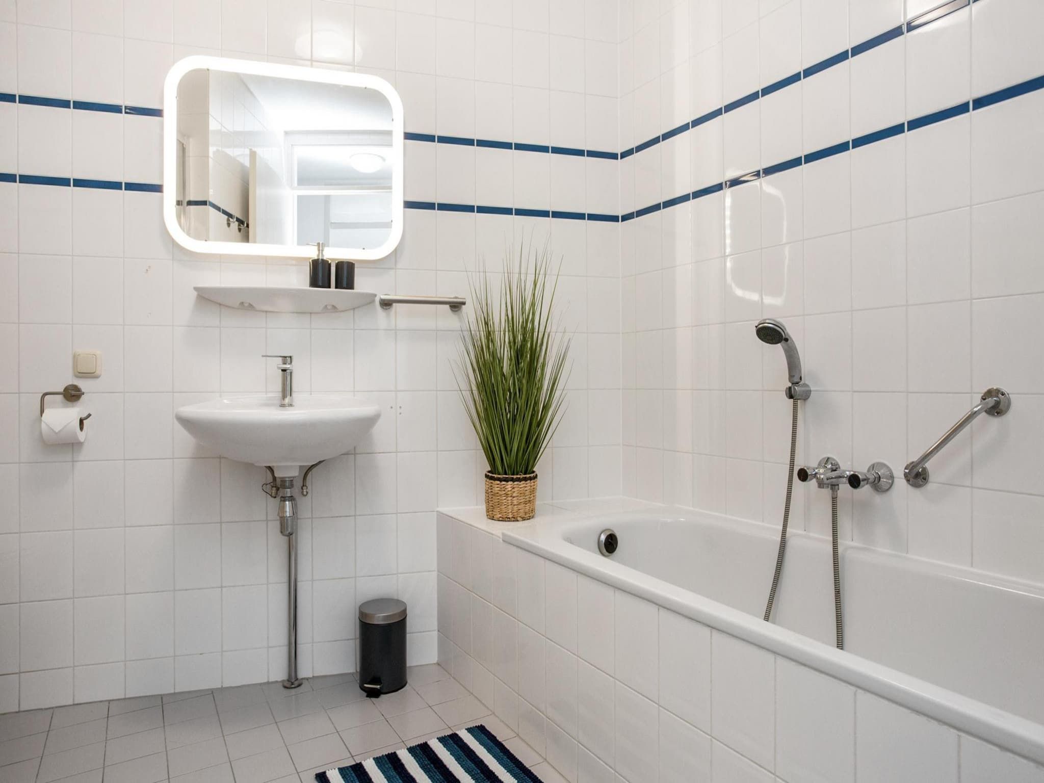De badkamer van Résidence Juliana 57 in Julianadorp aan Zee