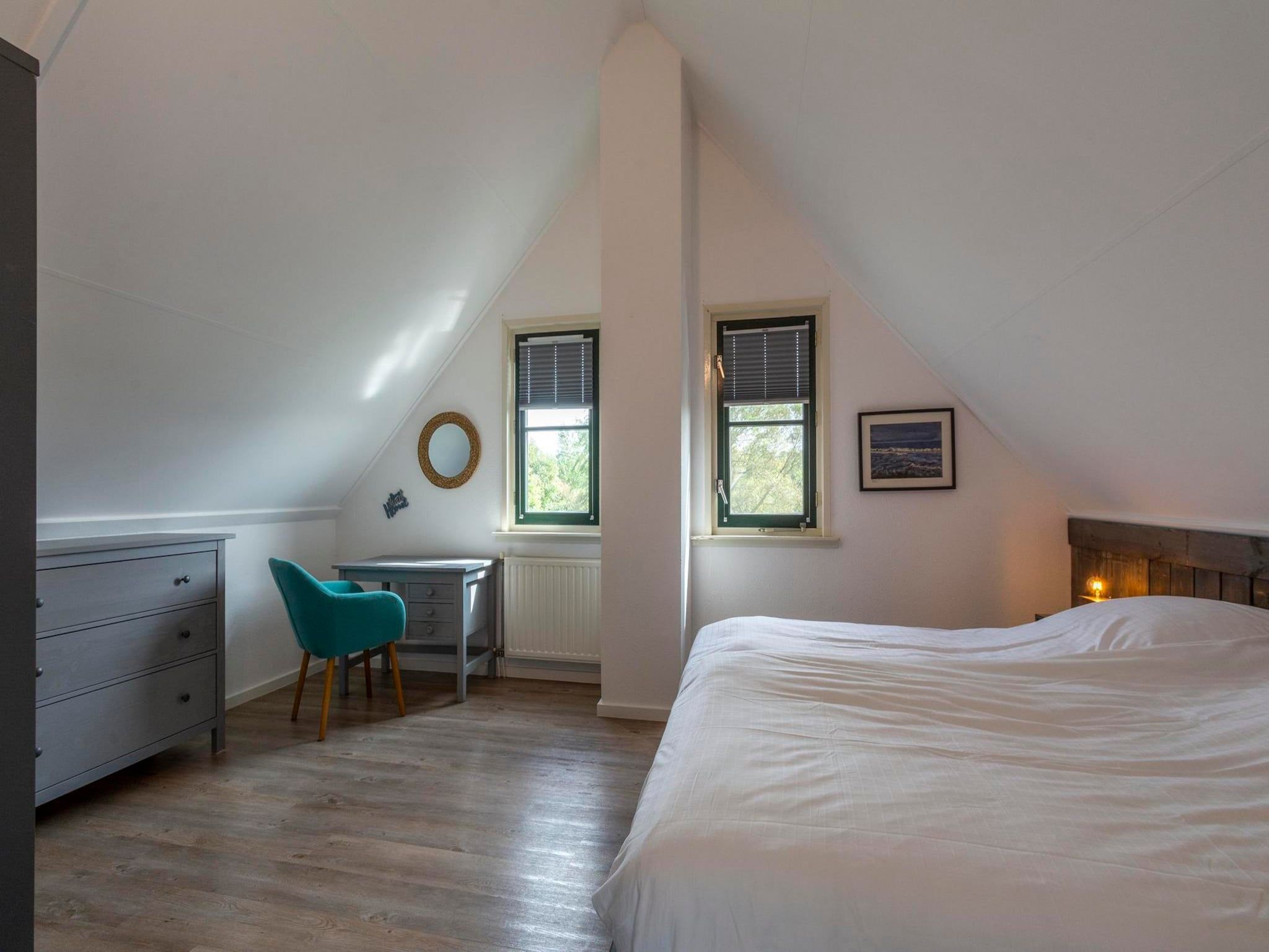 Een slaapkamer van De Buitenplaats 89 in Callantsoog