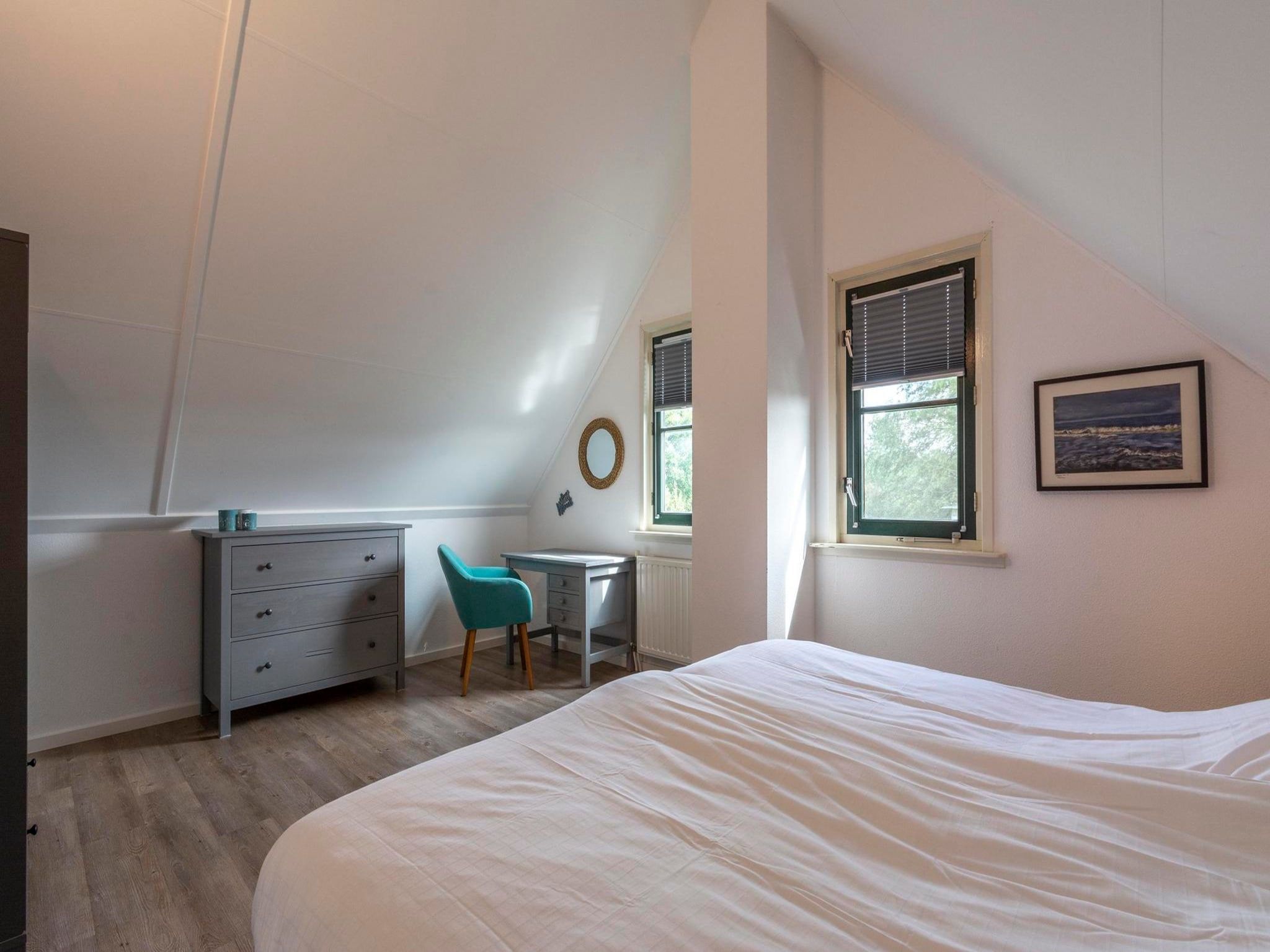 Een slaapkamer van De Buitenplaats 89 in Callantsoog