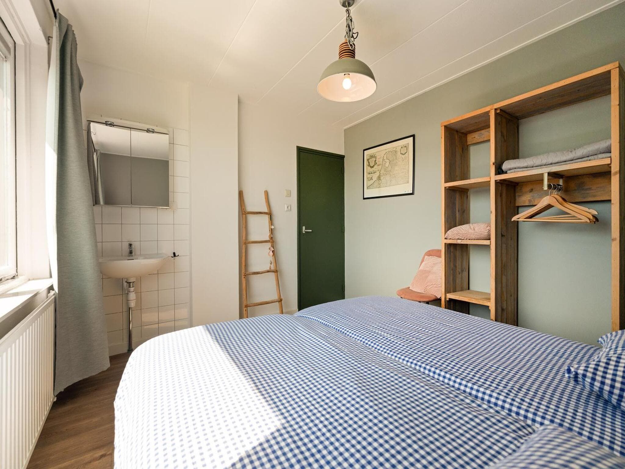 Een slaapkamer van Villa Zuidwester in Callantsoog