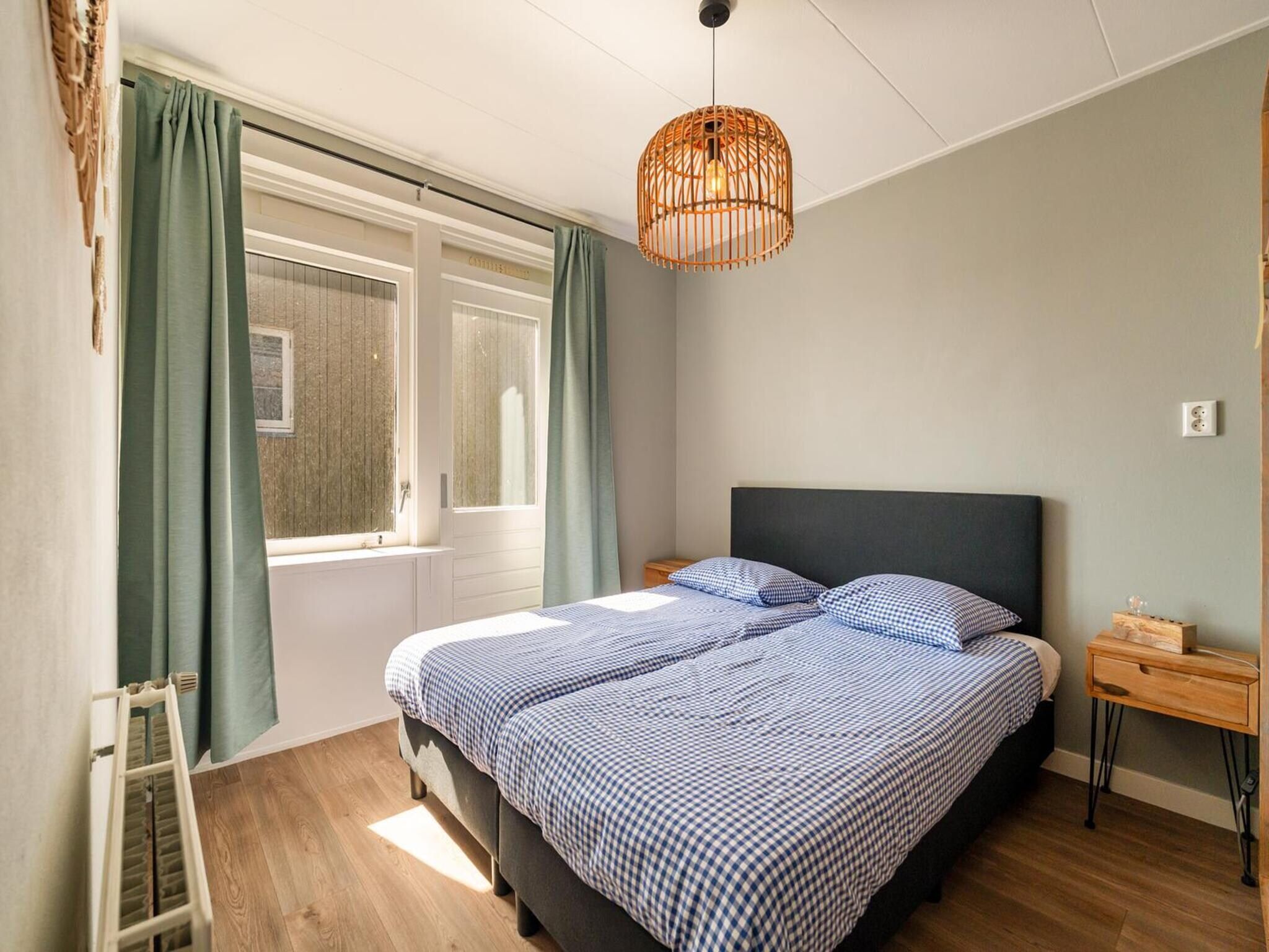 Een slaapkamer van Villa Zuidwester in Callantsoog
