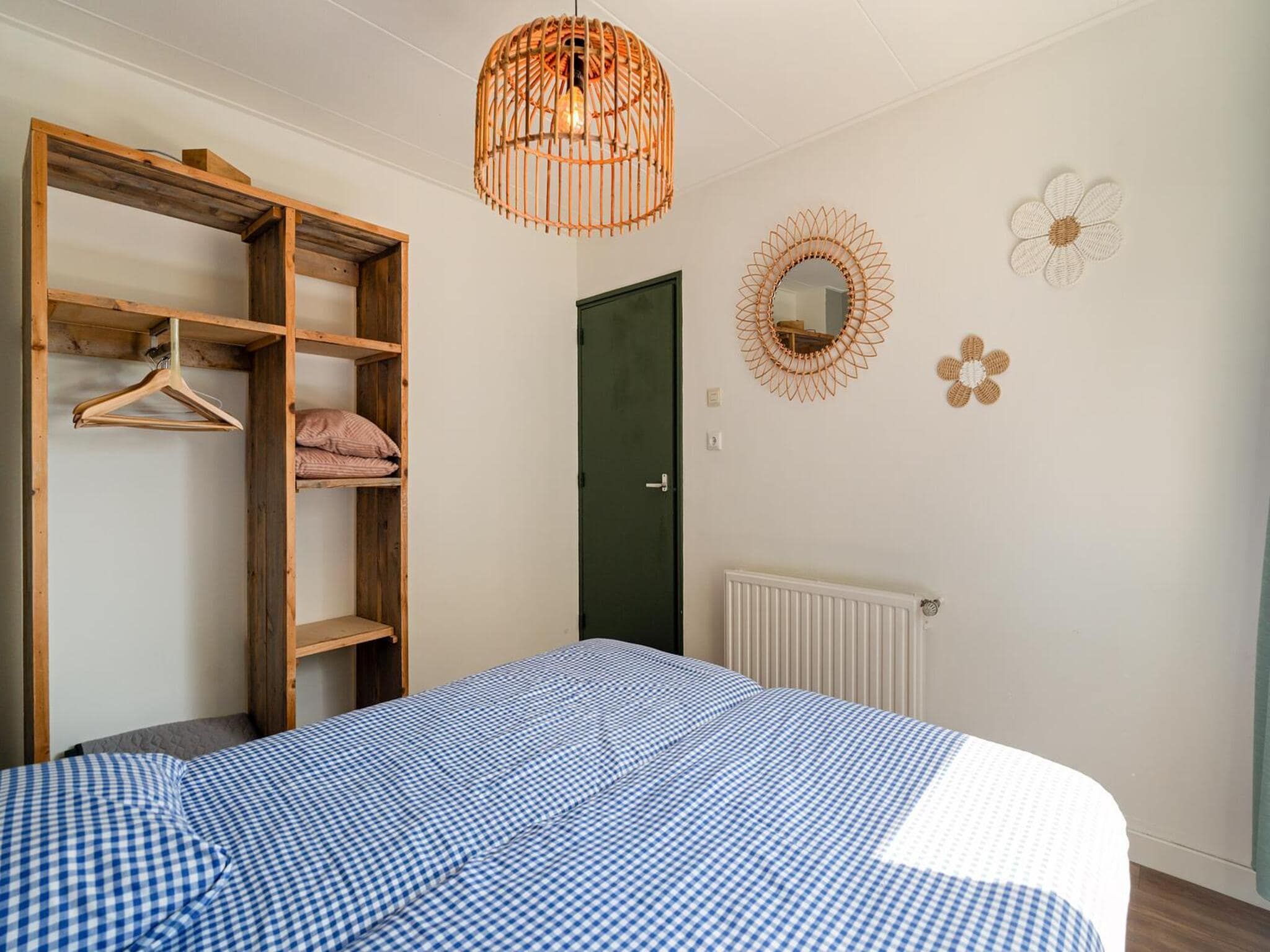 Een slaapkamer van Villa Zuidwester in Callantsoog