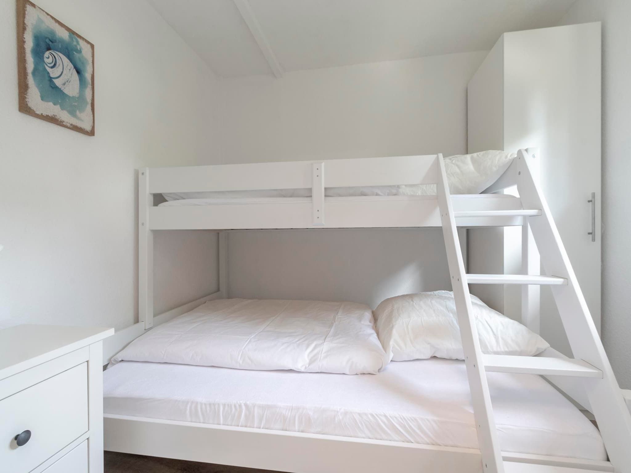 Een slaapkamer van Garnekuul 44 in Callantsoog
