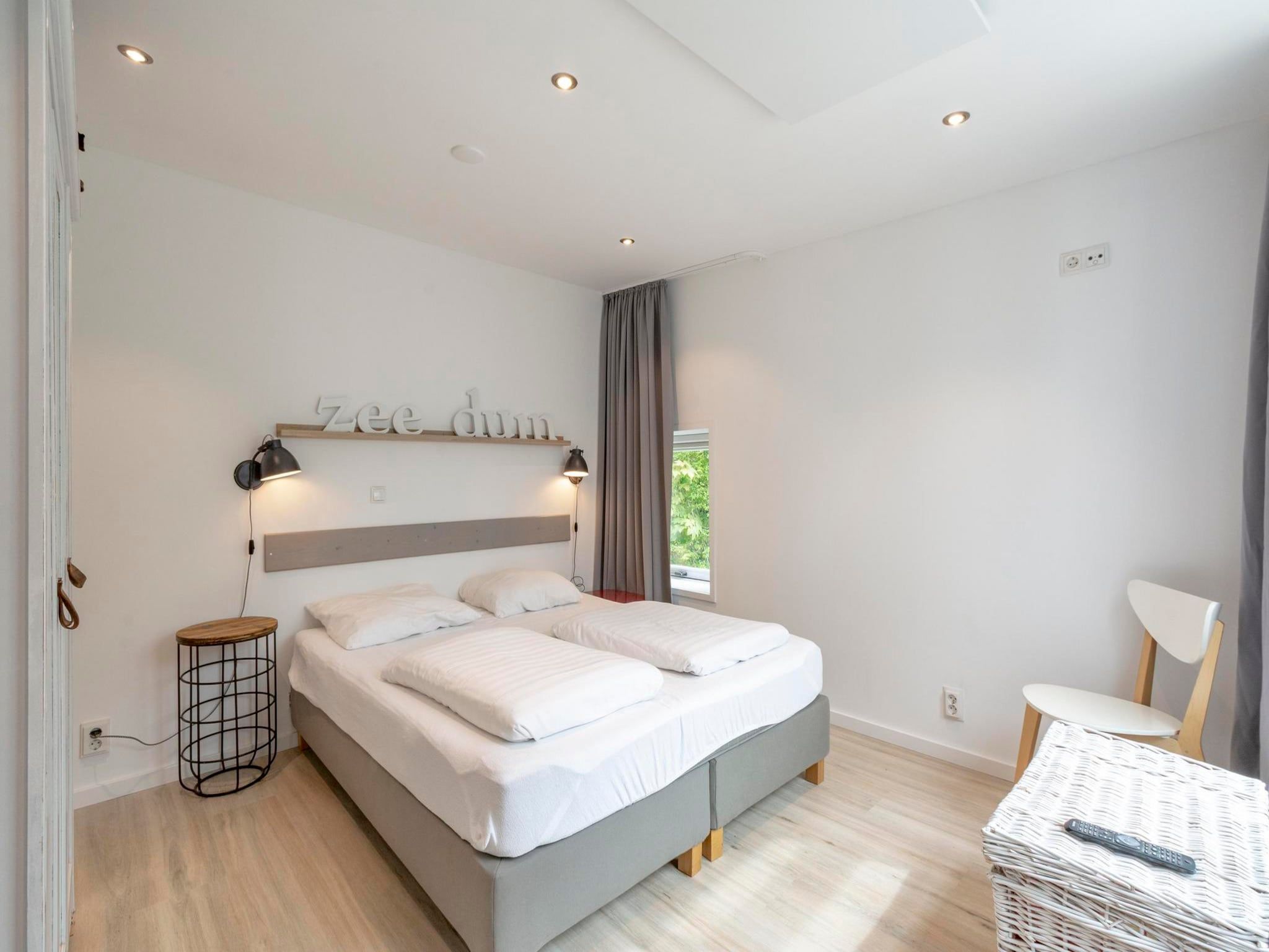 Een slaapkamer van Duinland 126 Kleine Mia in Sint Maartenszee