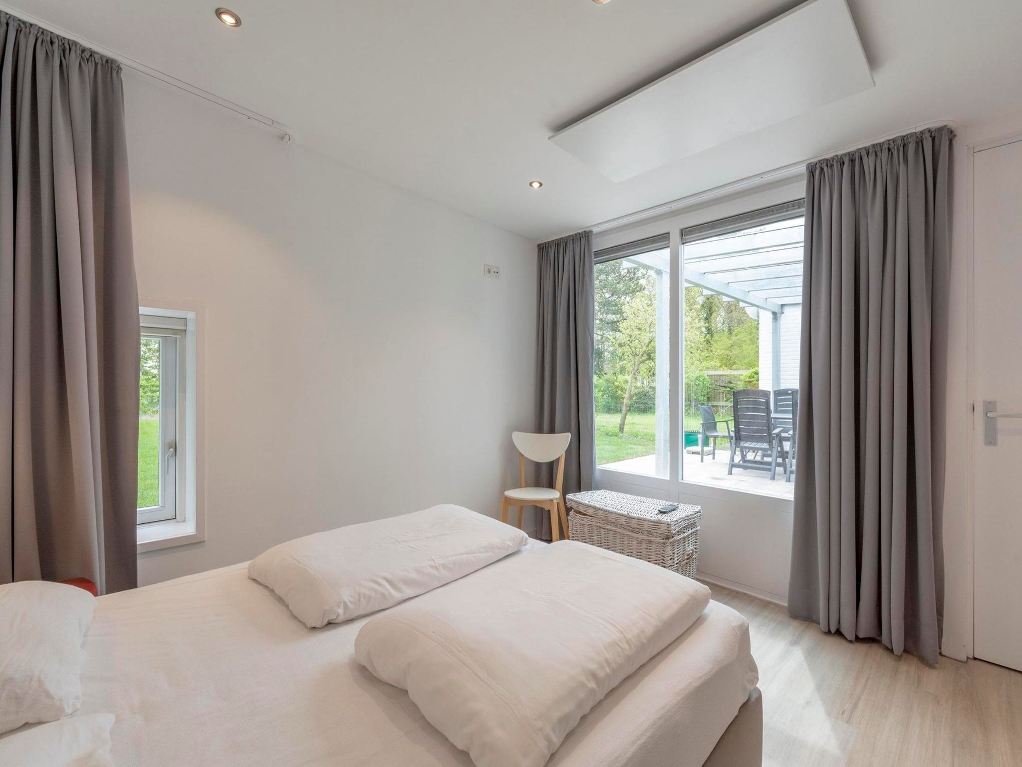 Een slaapkamer van Duinland 126 Kleine Mia in Sint Maartenszee