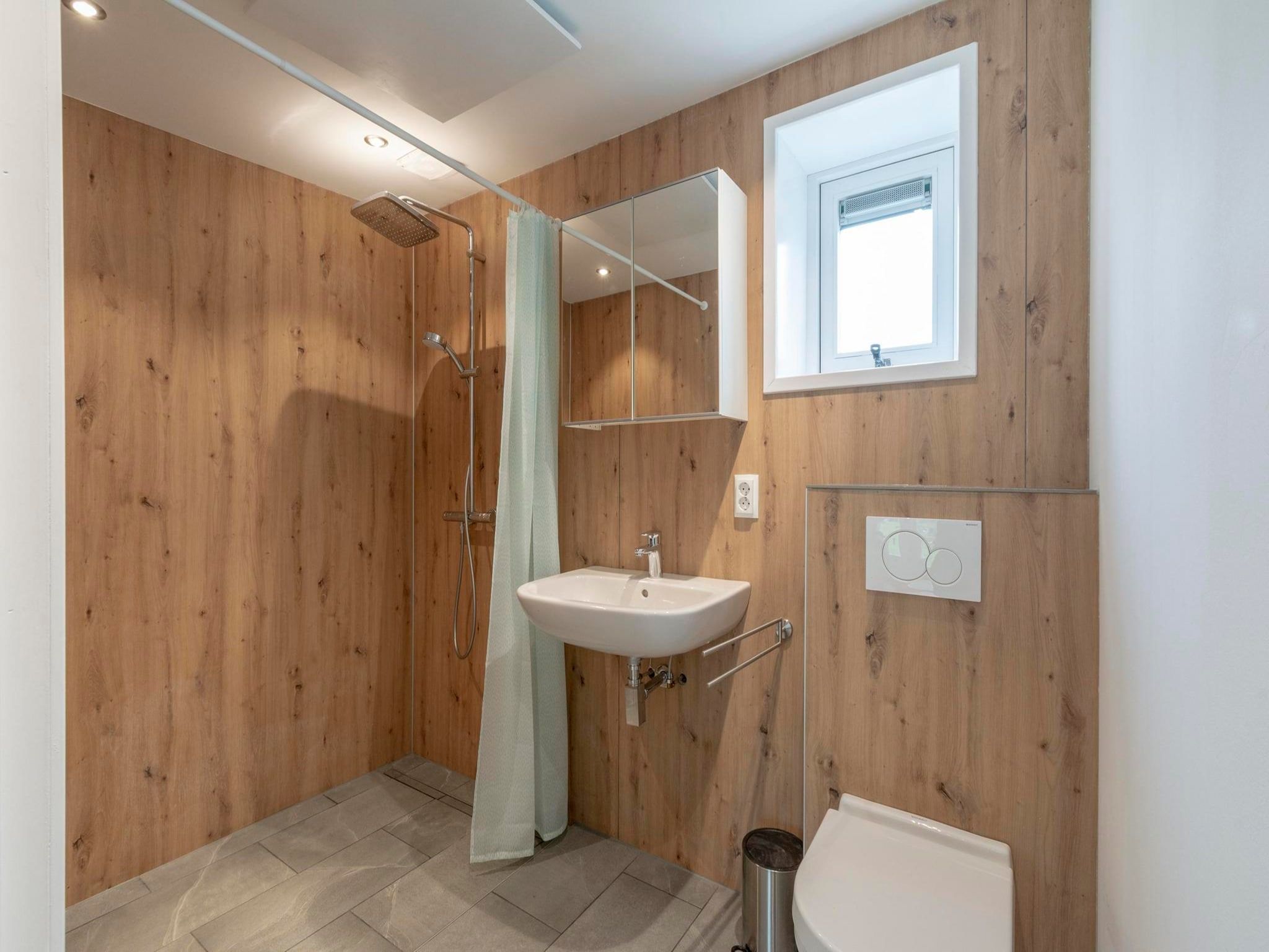 De badkamer van Duinland 126 Kleine Mia in Sint Maartenszee