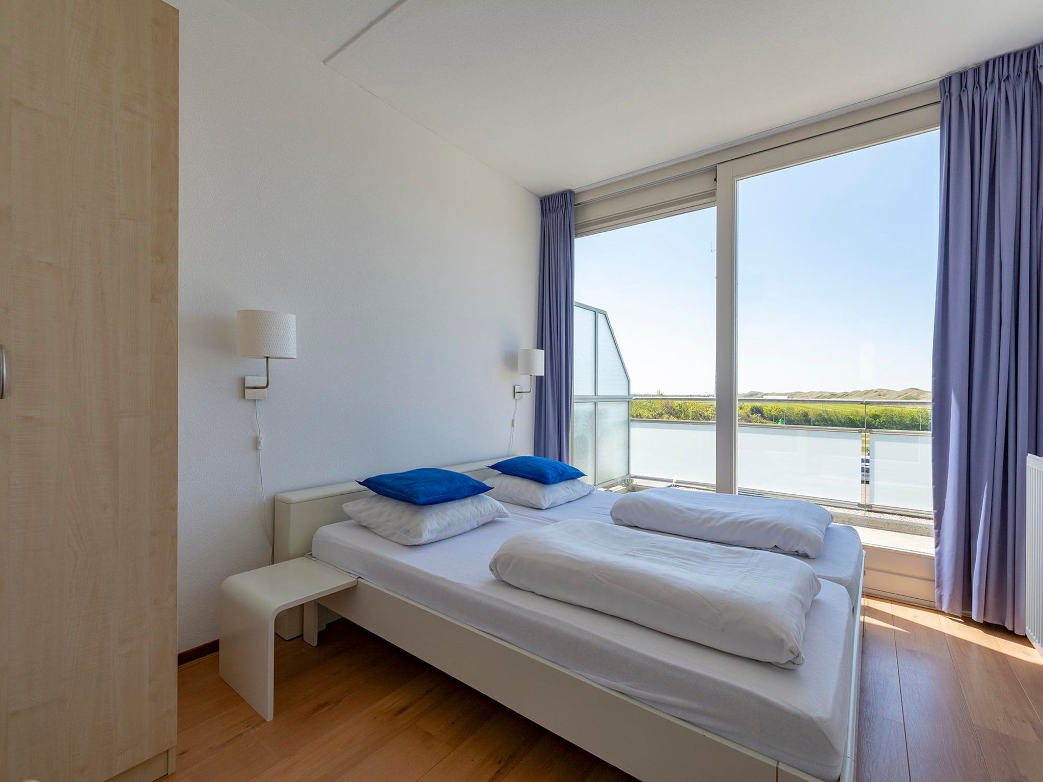 Een slaapkamer van Duinerei A202 in Groote Keeten
