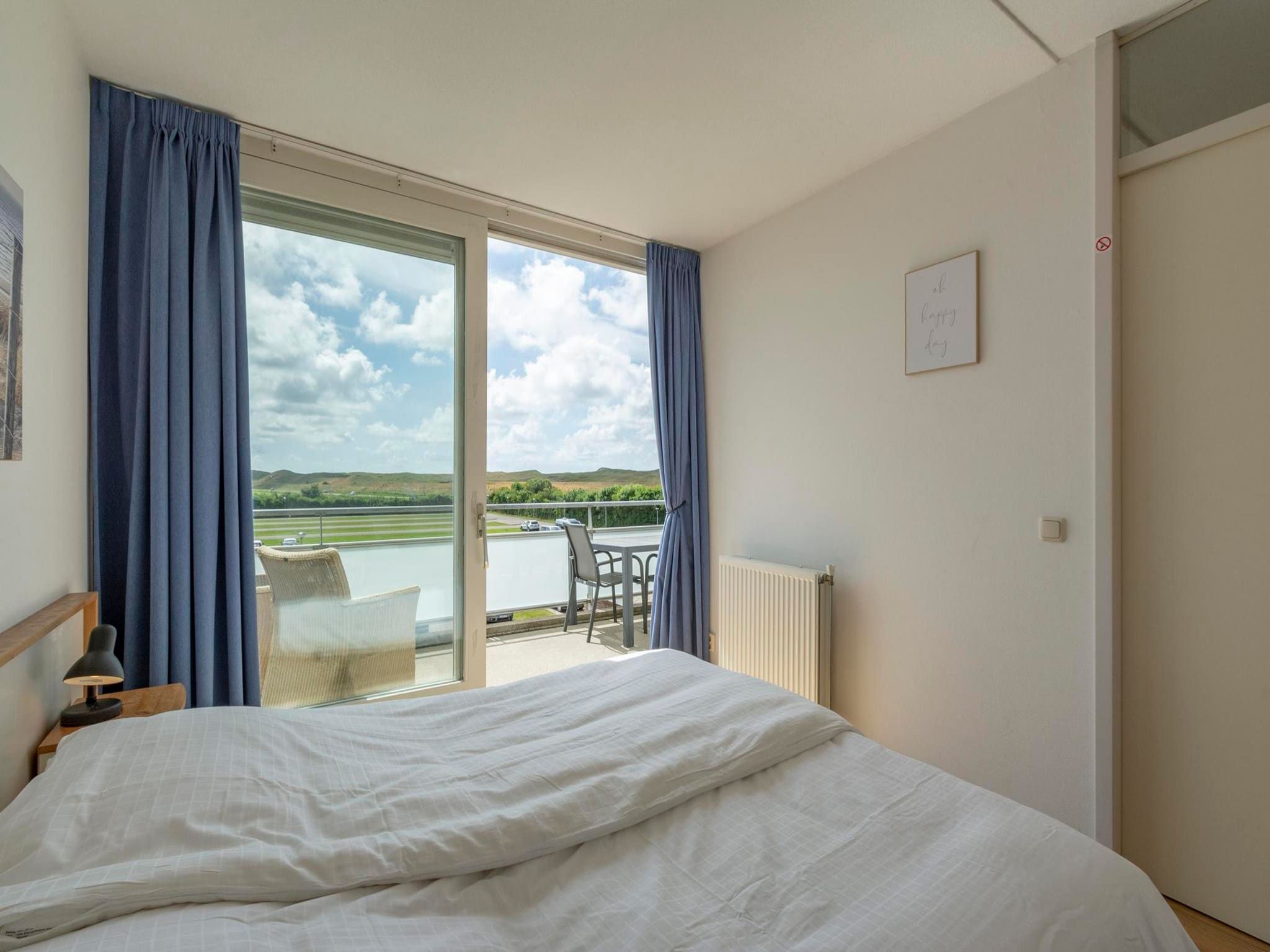 Een slaapkamer van Duinerei B202 in Groote Keeten