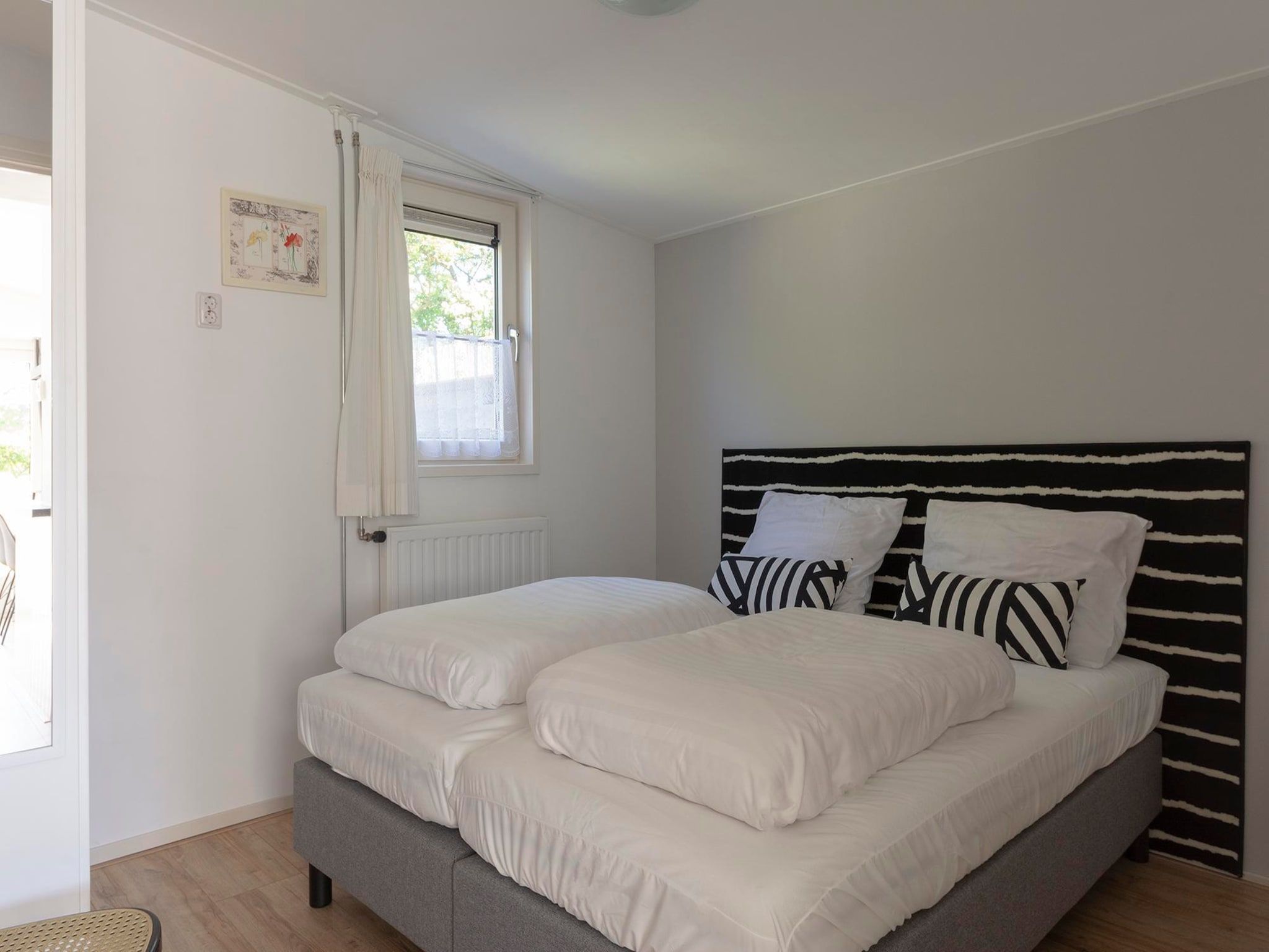 Een slaapkamer van Garnekuul 52 in Callantsoog