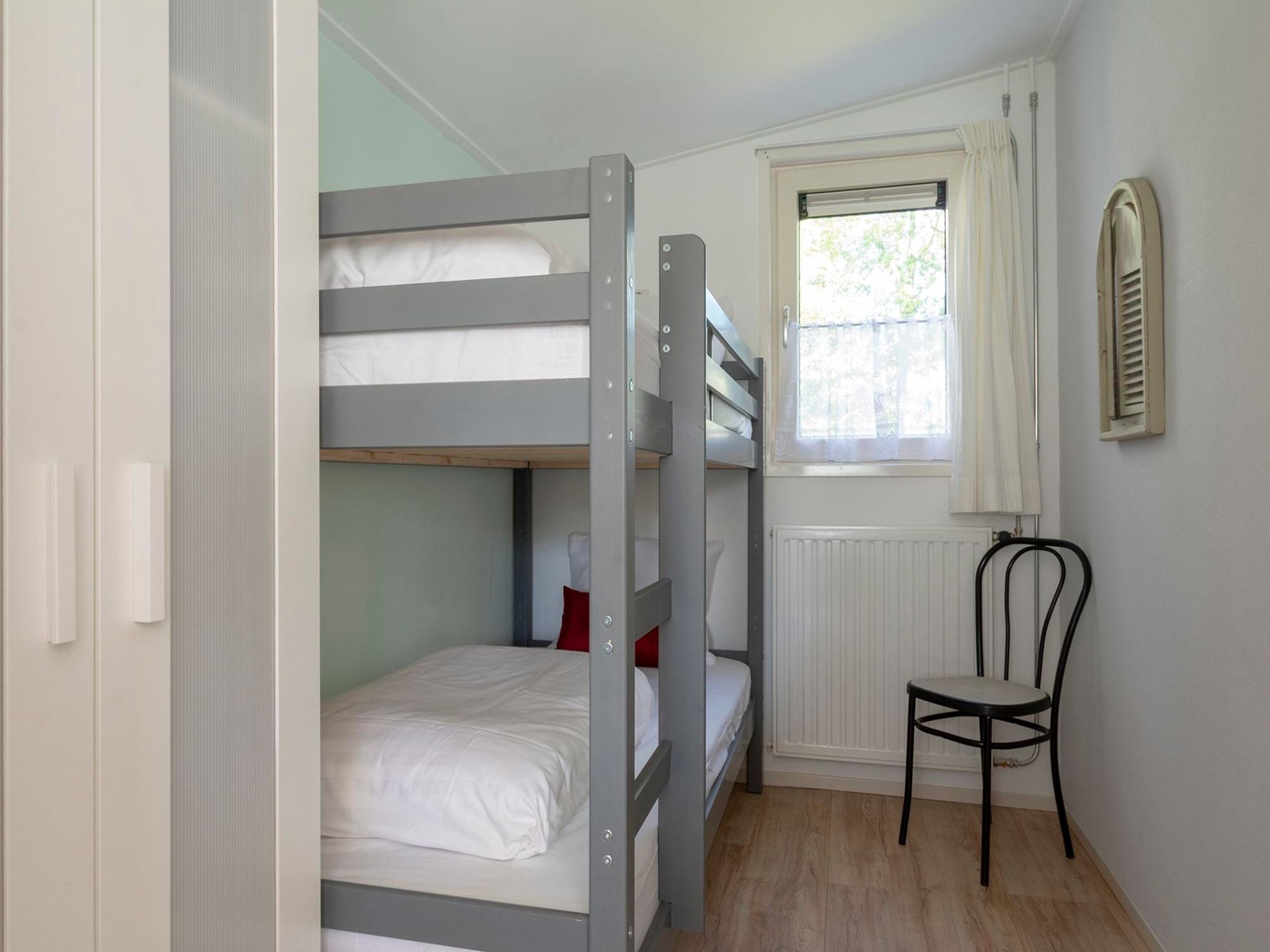 Een slaapkamer van Garnekuul 52 in Callantsoog