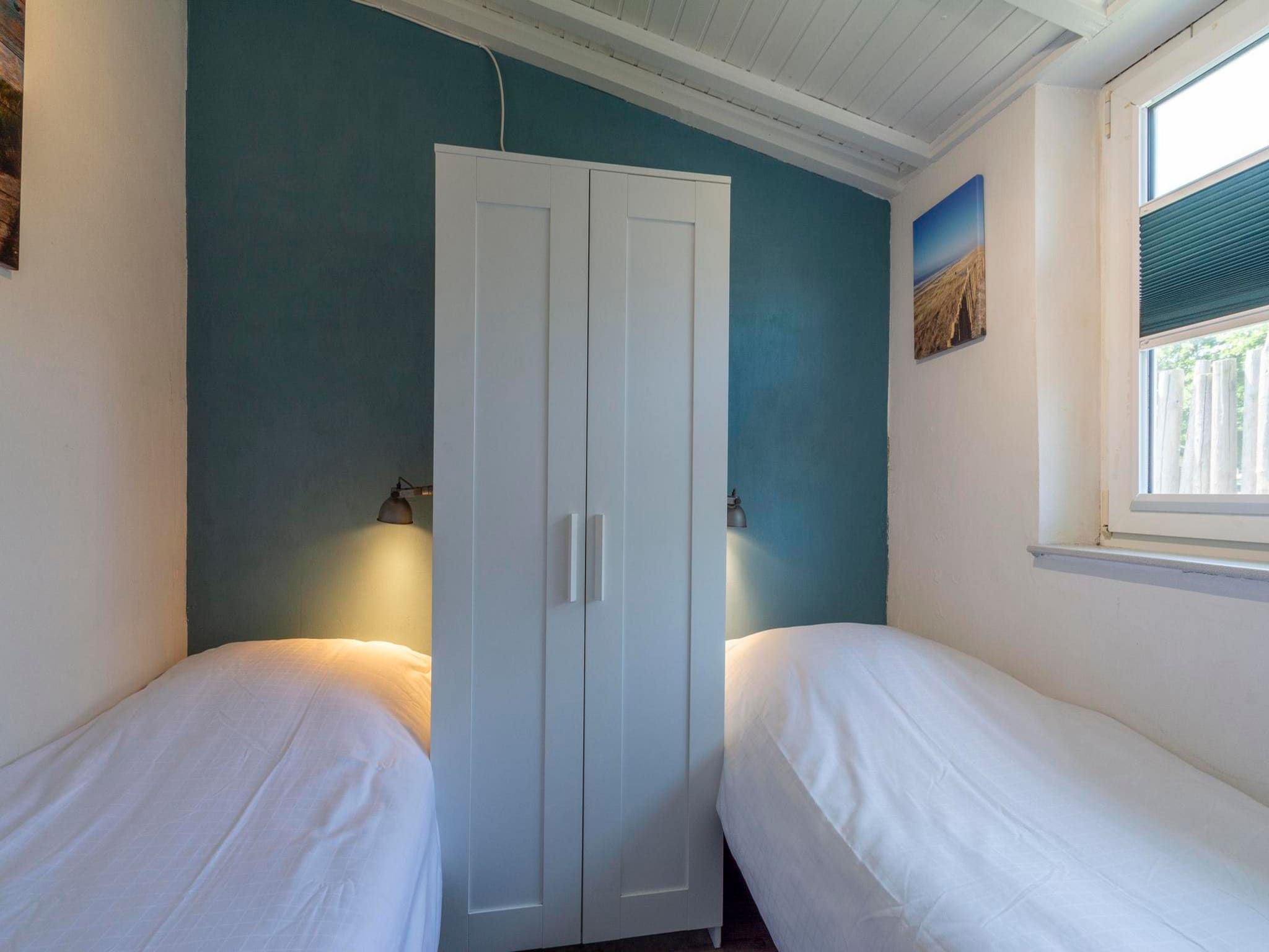 Een slaapkamer van Garnekuul 56 in Callantsoog