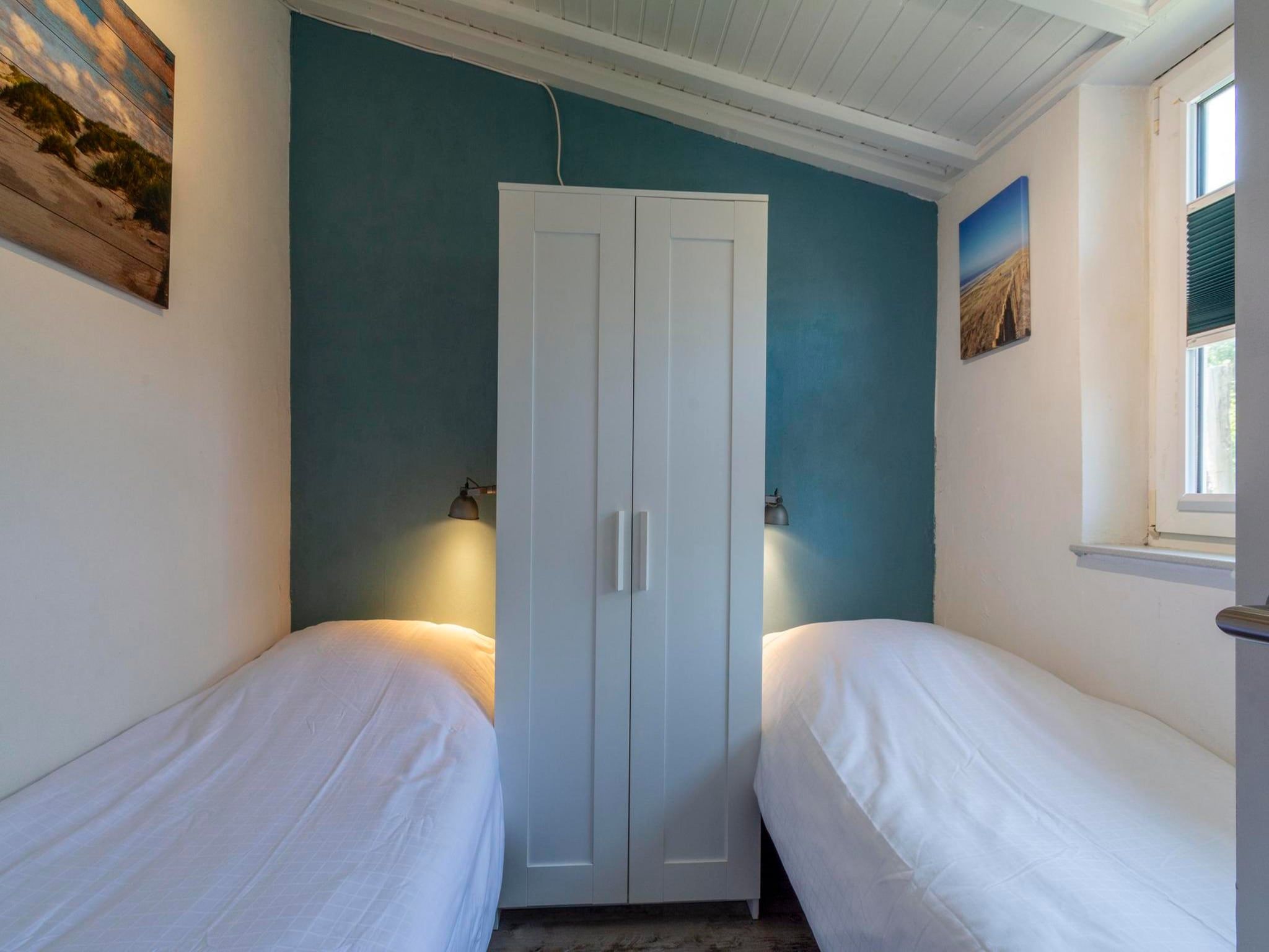 Een slaapkamer van Garnekuul 56 in Callantsoog