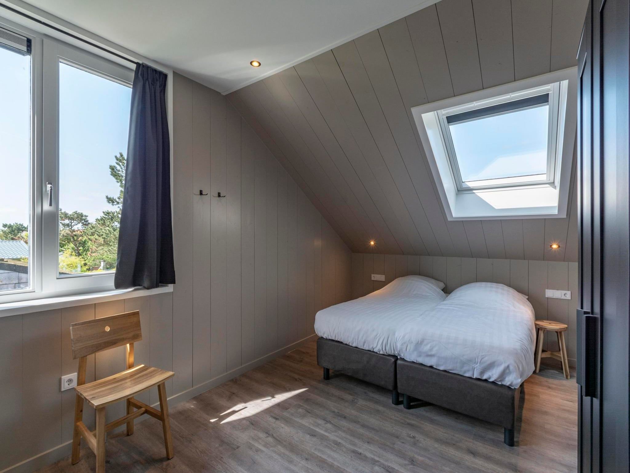 Een slaapkamer van Wellness Villa Lotje in Julianadorp aan Zee