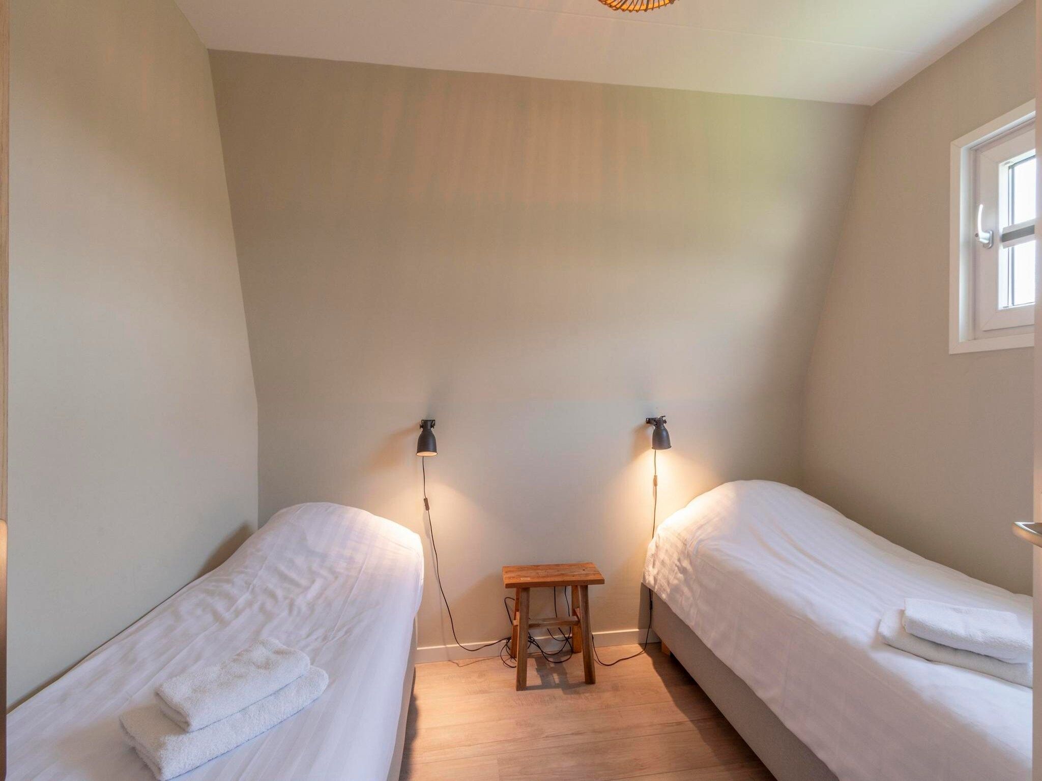 Een slaapkamer van Garnekuul 6 in Callantsoog
