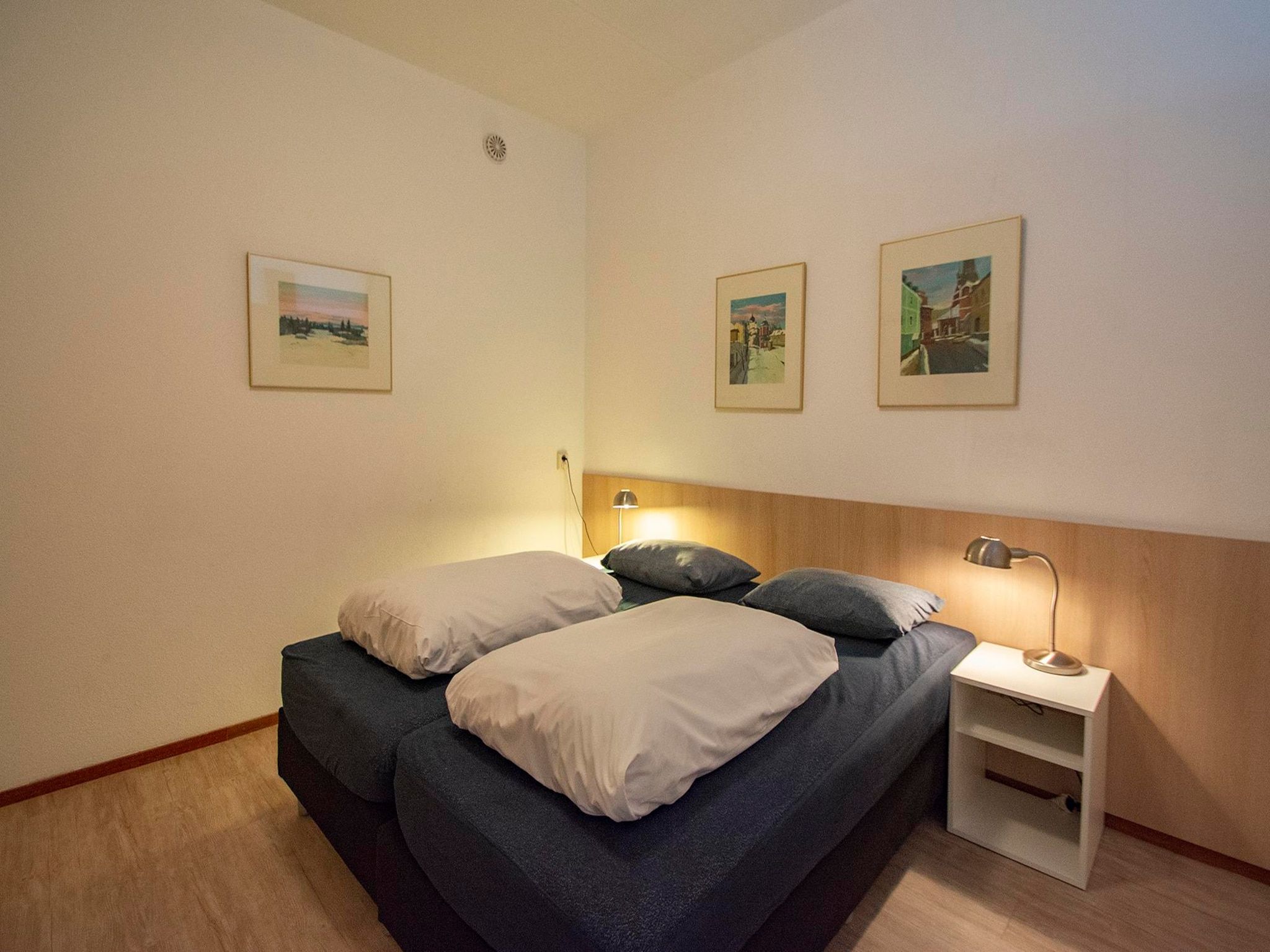 Een slaapkamer van Wijde Blick 103 in Callantsoog