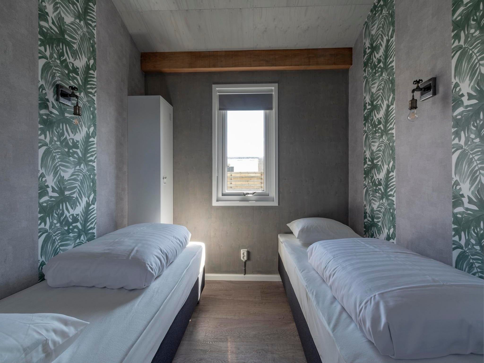 Een slaapkamer van Garnekuul 7 in Callantsoog