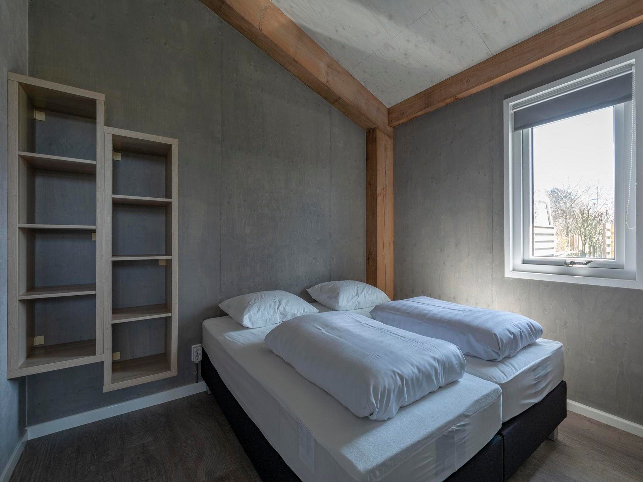 Een slaapkamer van Garnekuul 7 in Callantsoog