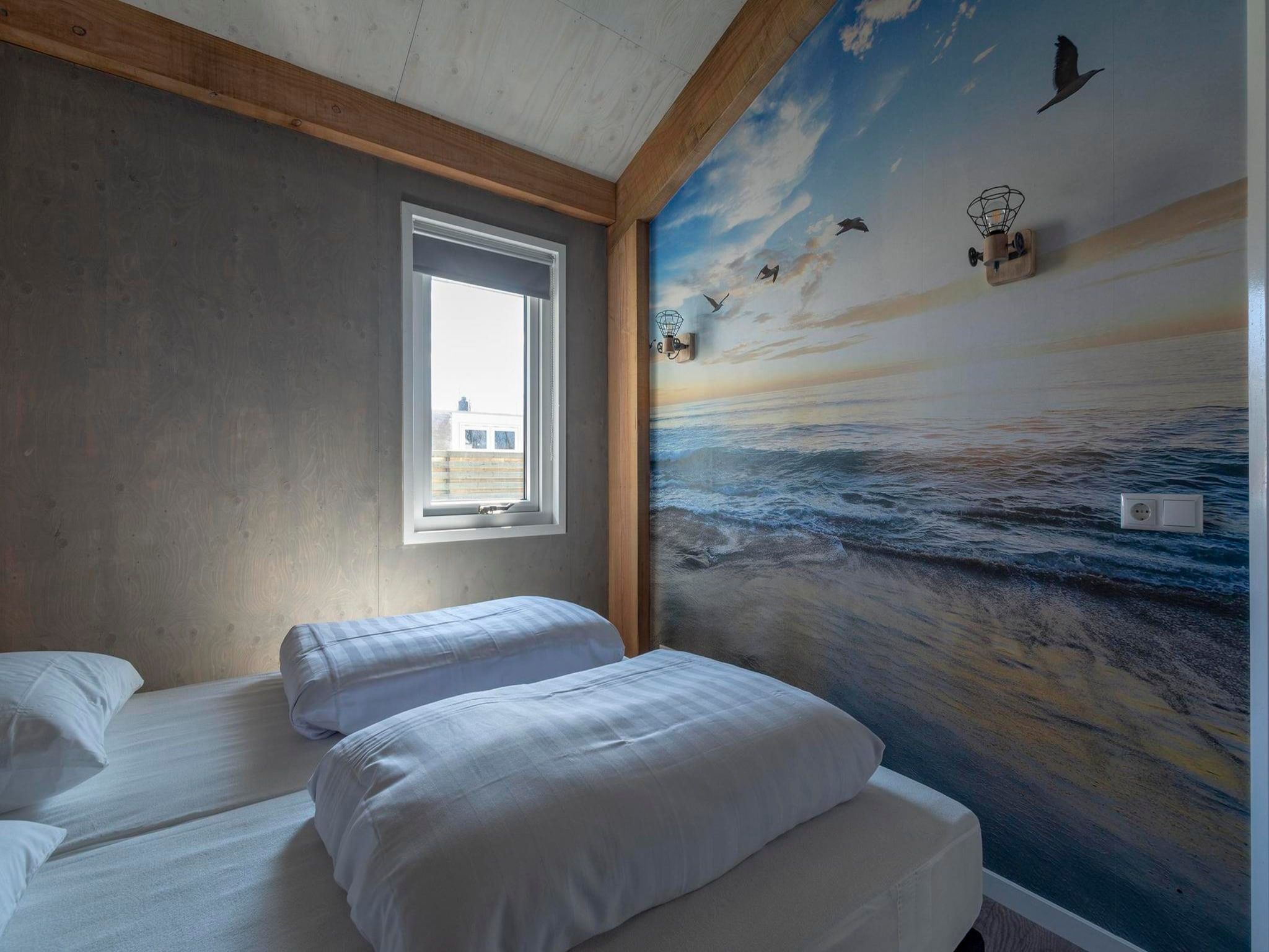 Een slaapkamer van Garnekuul 7 in Callantsoog