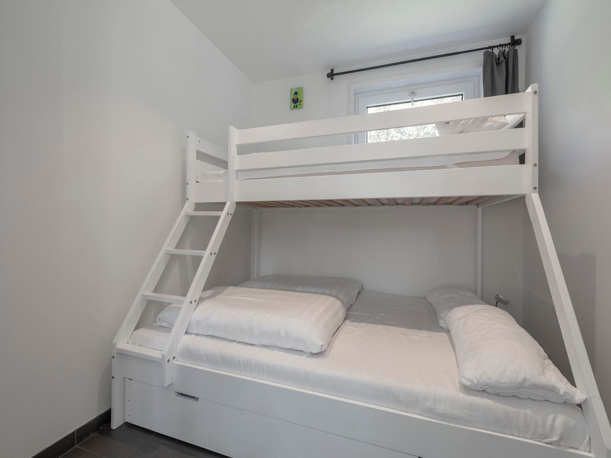 Een slaapkamer van Garnekuul 76 in Callantsoog