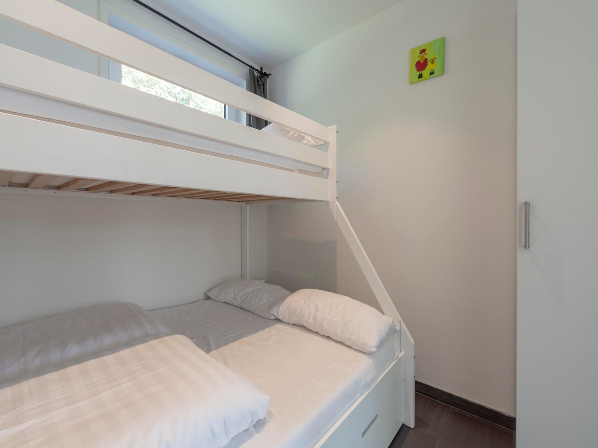 Een slaapkamer van Garnekuul 76 in Callantsoog