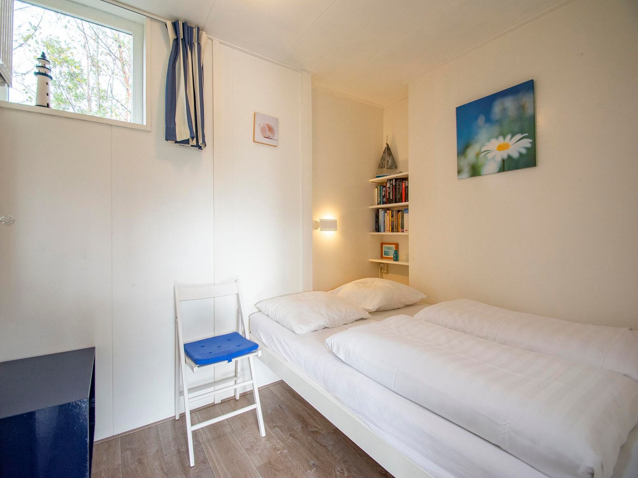 Een slaapkamer van Garnekuul 81 in Callantsoog