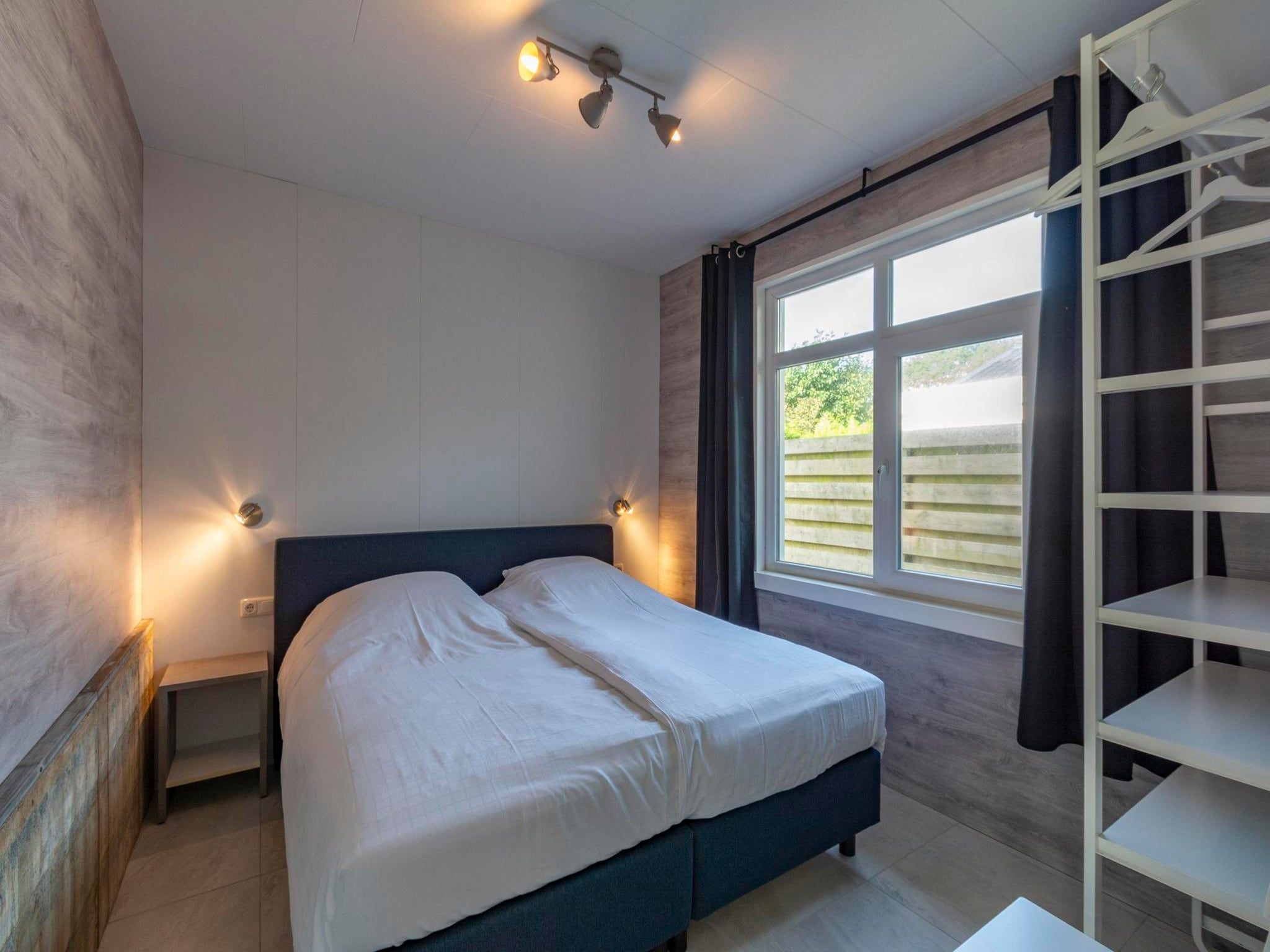 Een slaapkamer van Garnekuul 90 in Callantsoog