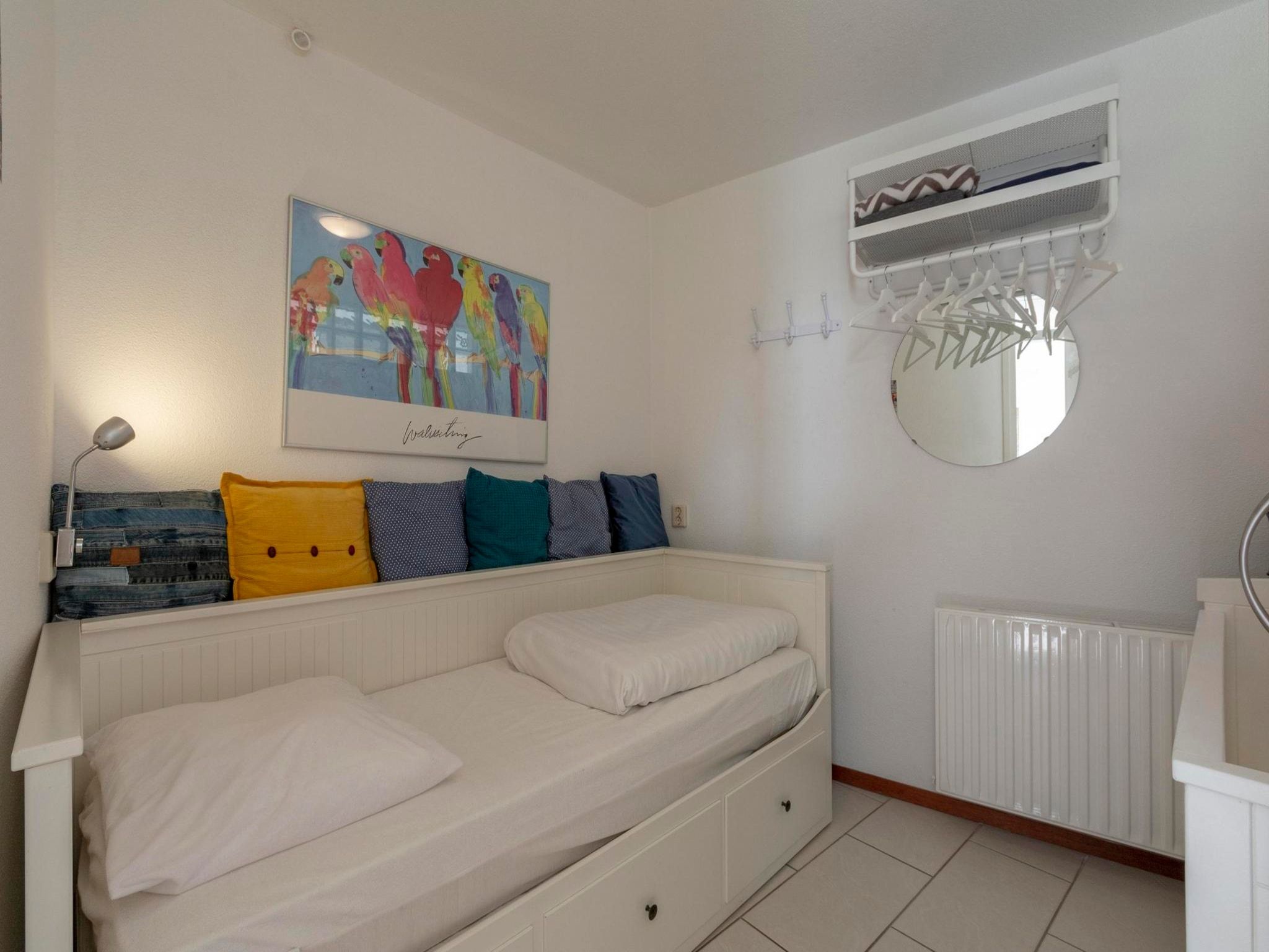 Een slaapkamer van Wijde Blick 205 in Callantsoog