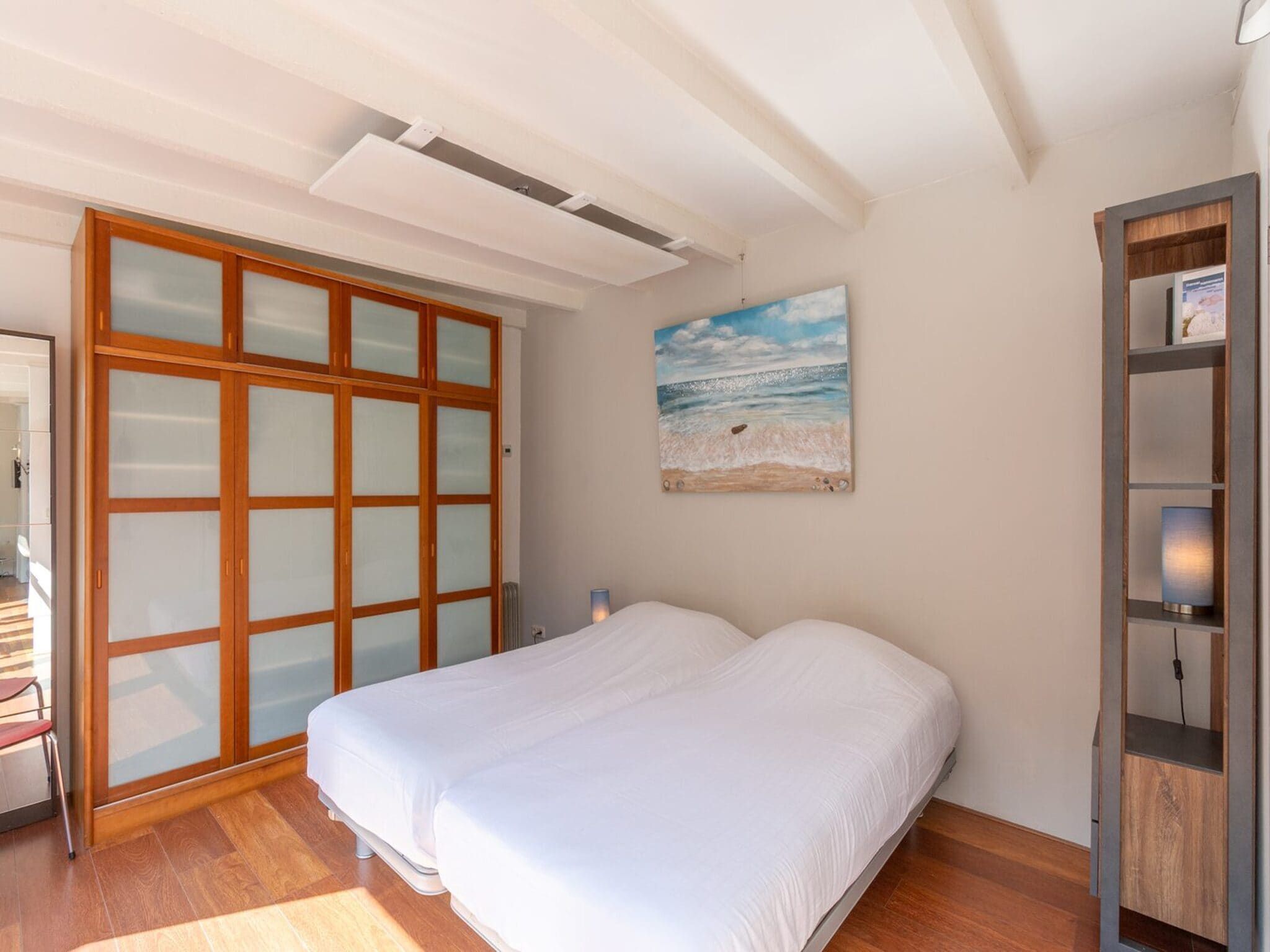 Een slaapkamer van Duinland 122 in Sint Maartenszee
