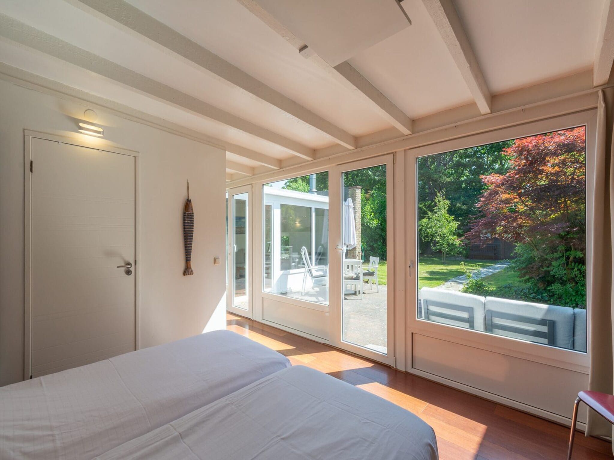 Een slaapkamer van Duinland 122 in Sint Maartenszee