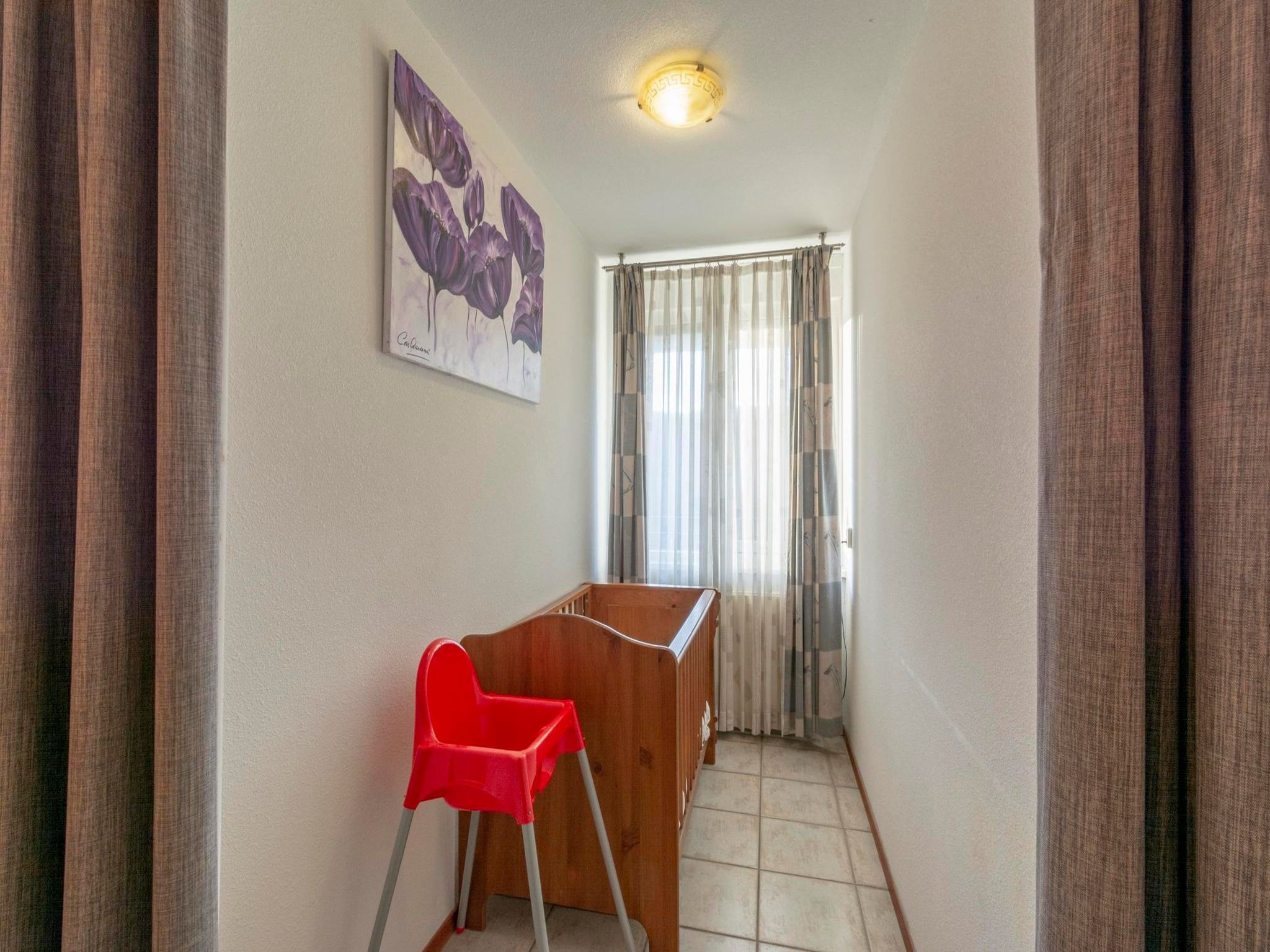Een slaapkamer van Wijde Blick 210 in Callantsoog