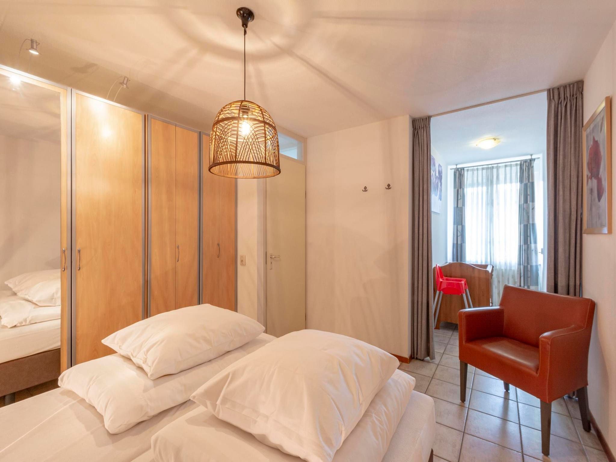 Een slaapkamer van Wijde Blick 210 in Callantsoog