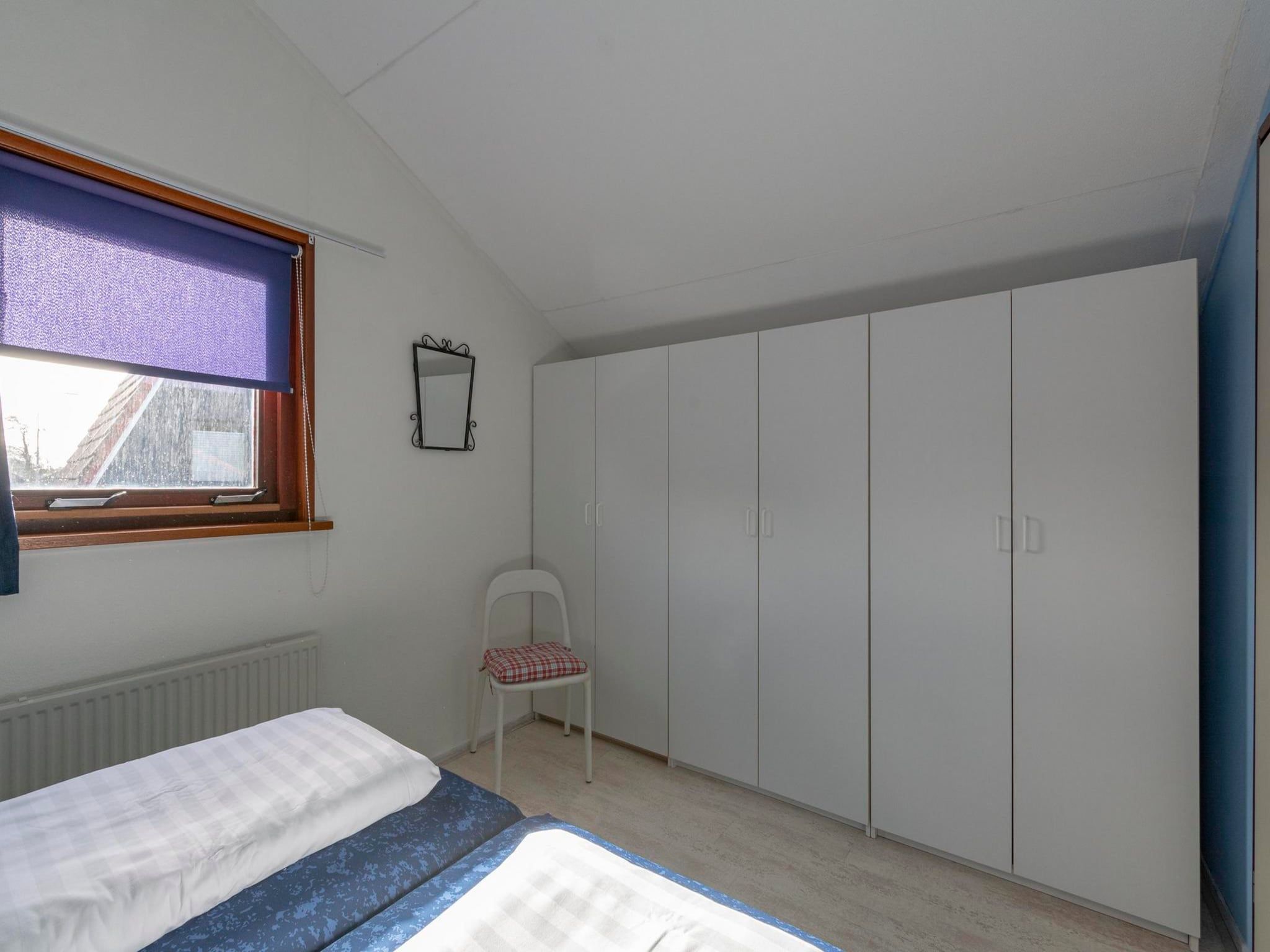 Een slaapkamer van Yperhof 66 in Julianadorp aan Zee