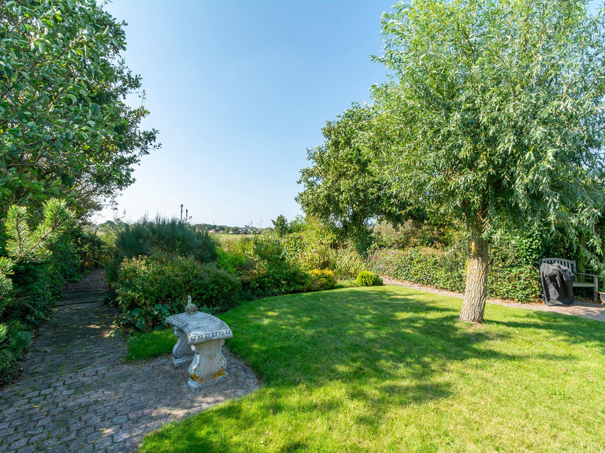 De tuin van De Buitenplaats 7 in Callantsoog
