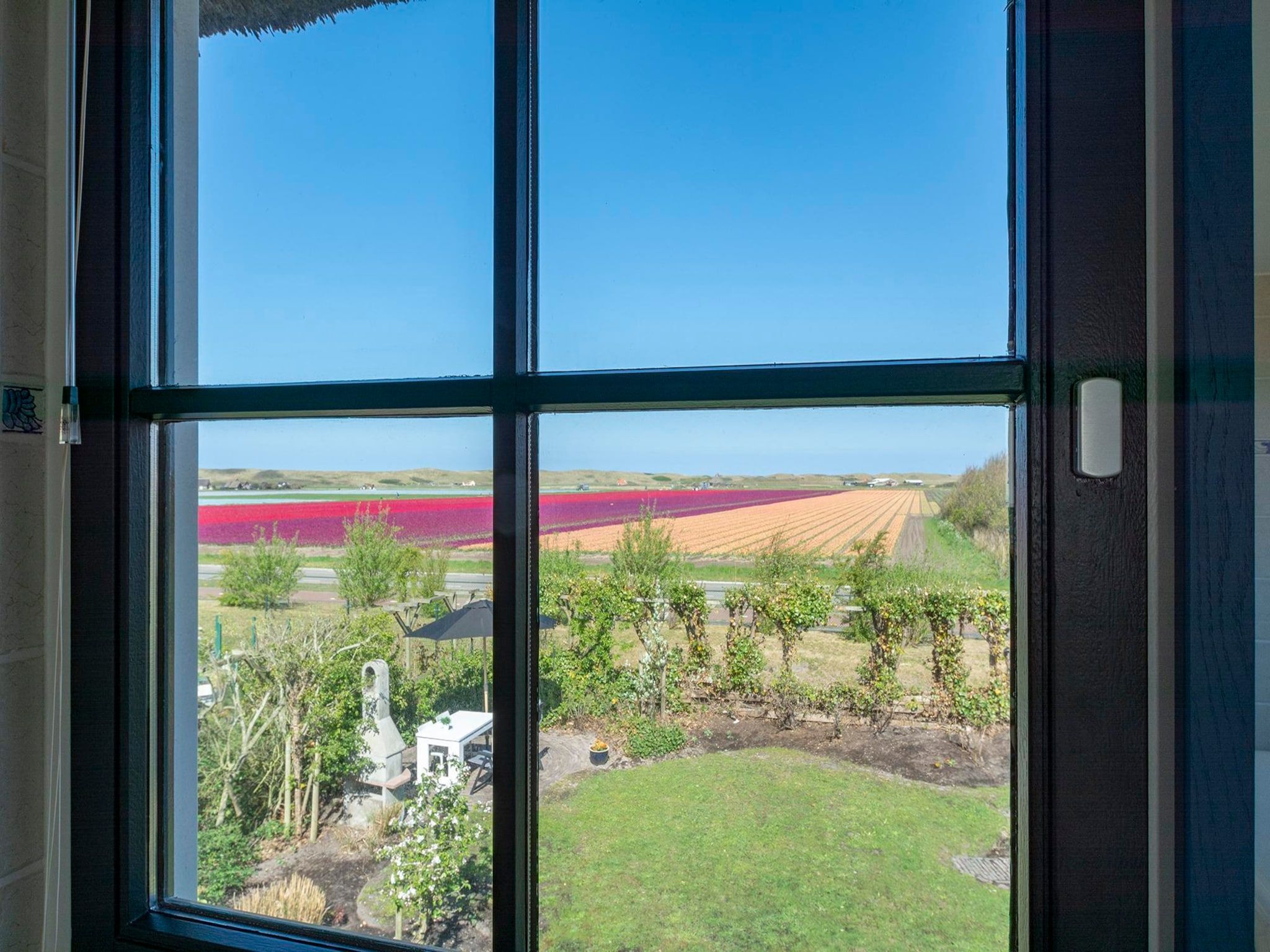 Het uitzicht vanaf De Buitenplaats 113 in Callantsoog