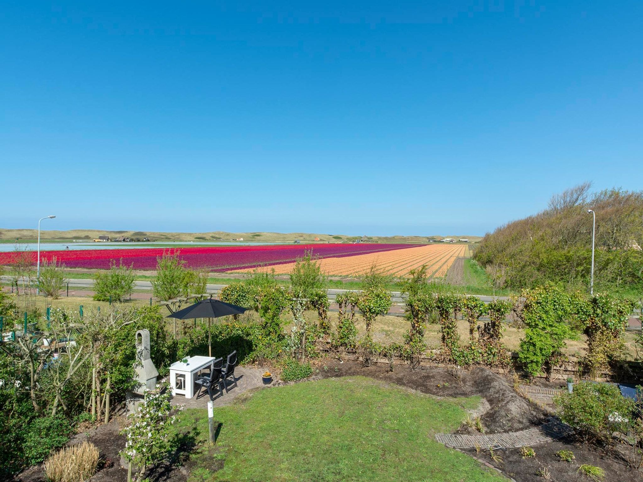 Het uitzicht vanaf De Buitenplaats 113 in Callantsoog