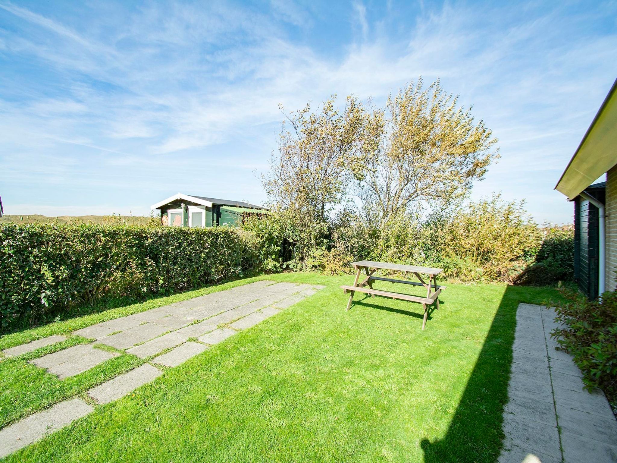 De tuin van Callantsogervaart 3-8 in Julianadorp aan Zee