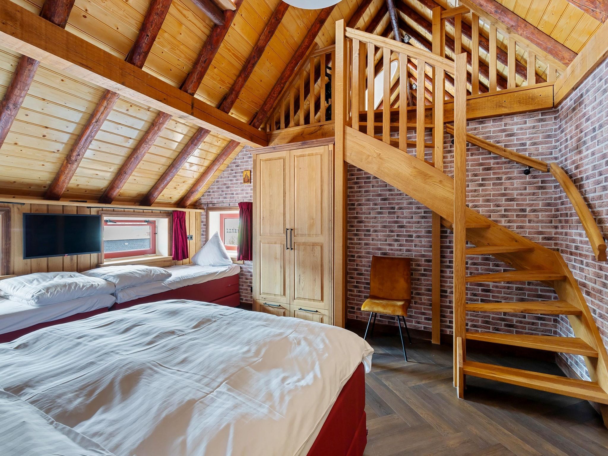 Een slaapkamer van Oane's Huske en it Simmerhuske in Jistrum / Skûlenboarch