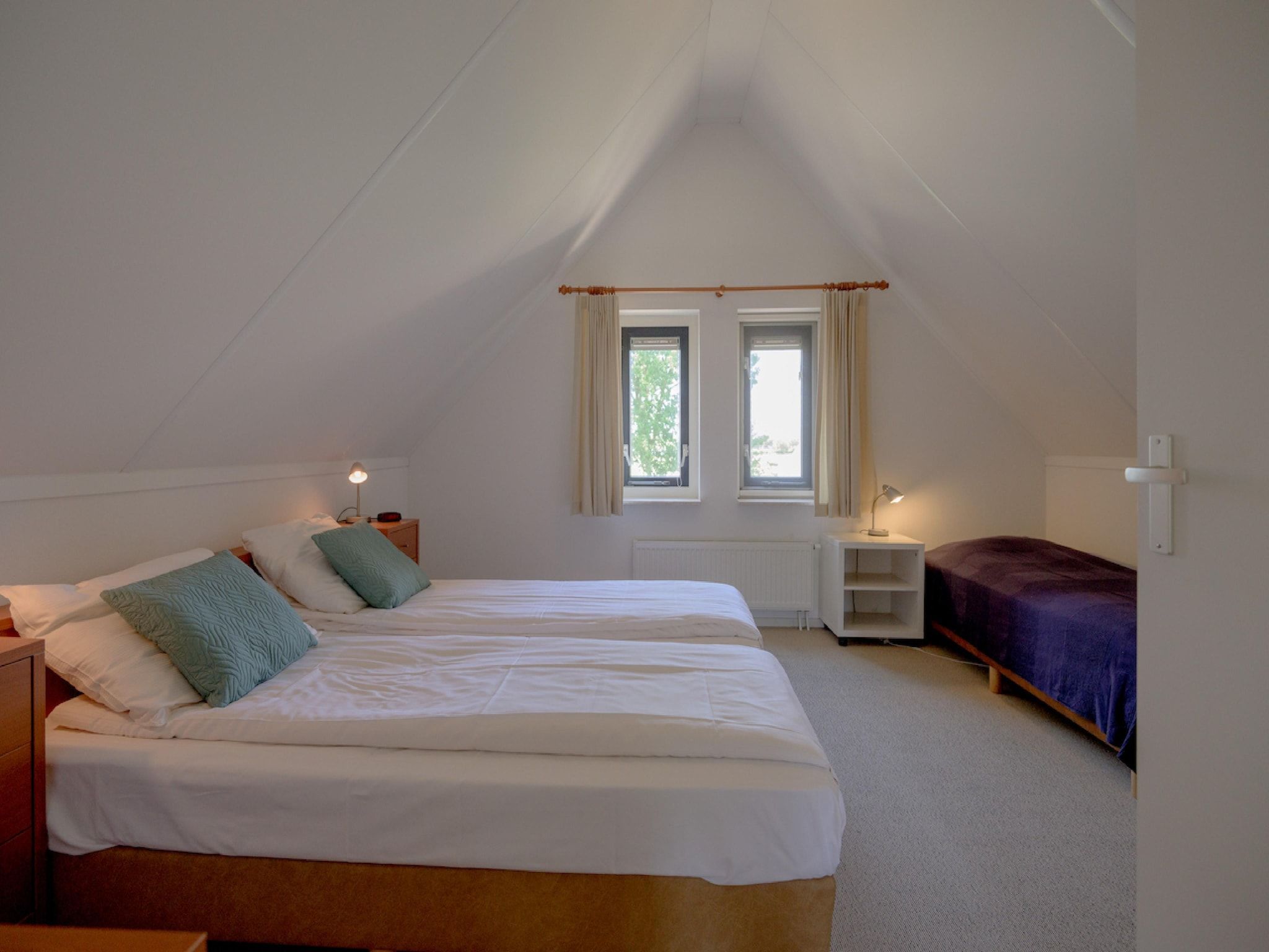 Een slaapkamer van 4-persoons bungalow Sondel 16 in Sondel