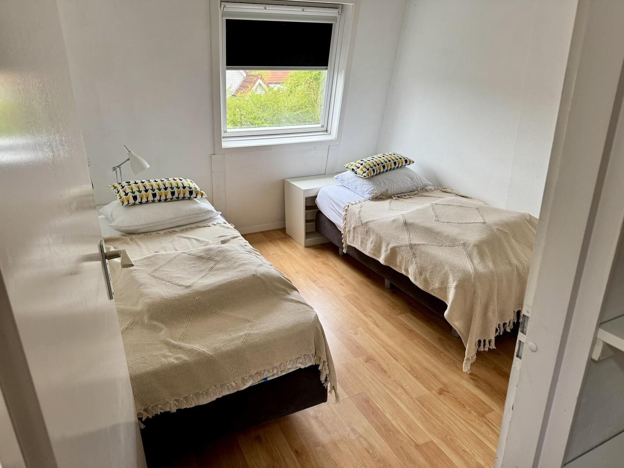 Een slaapkamer van Strandhuis Schoneveld in Breskens